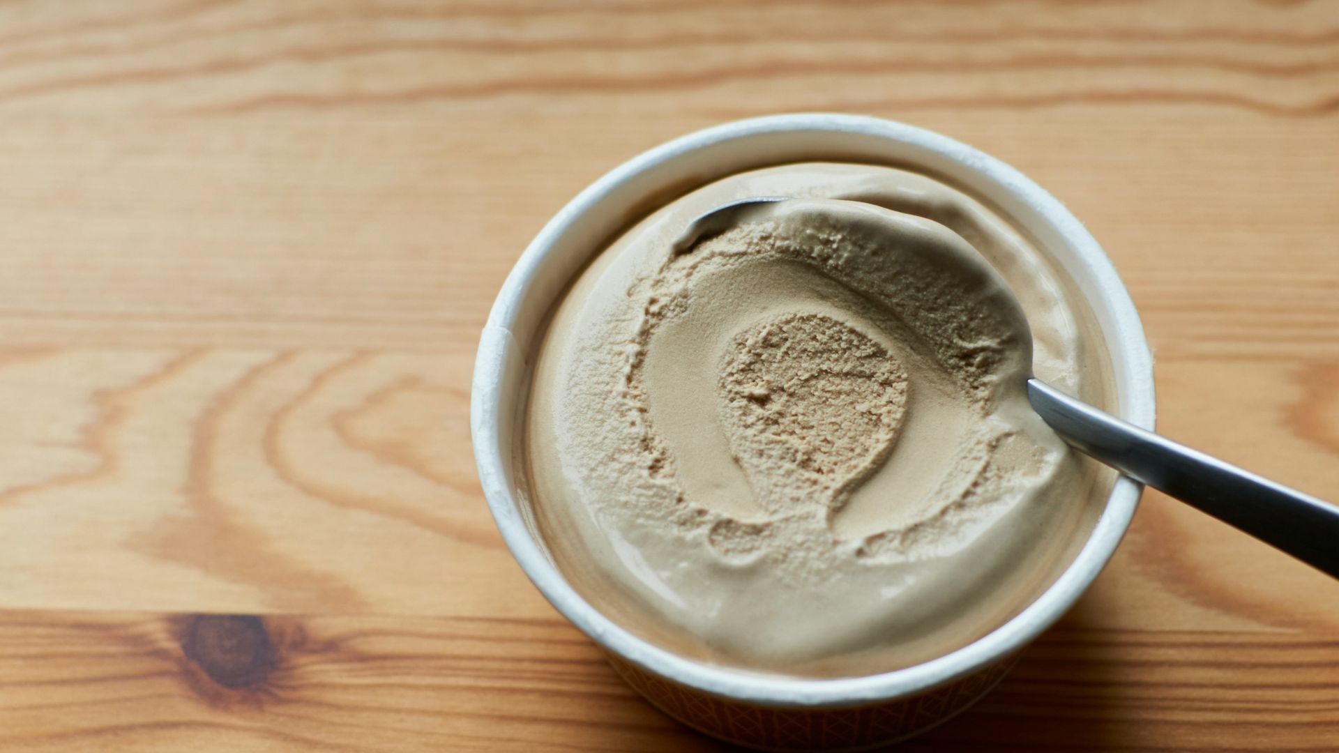 white ceramic cup with white ice cream