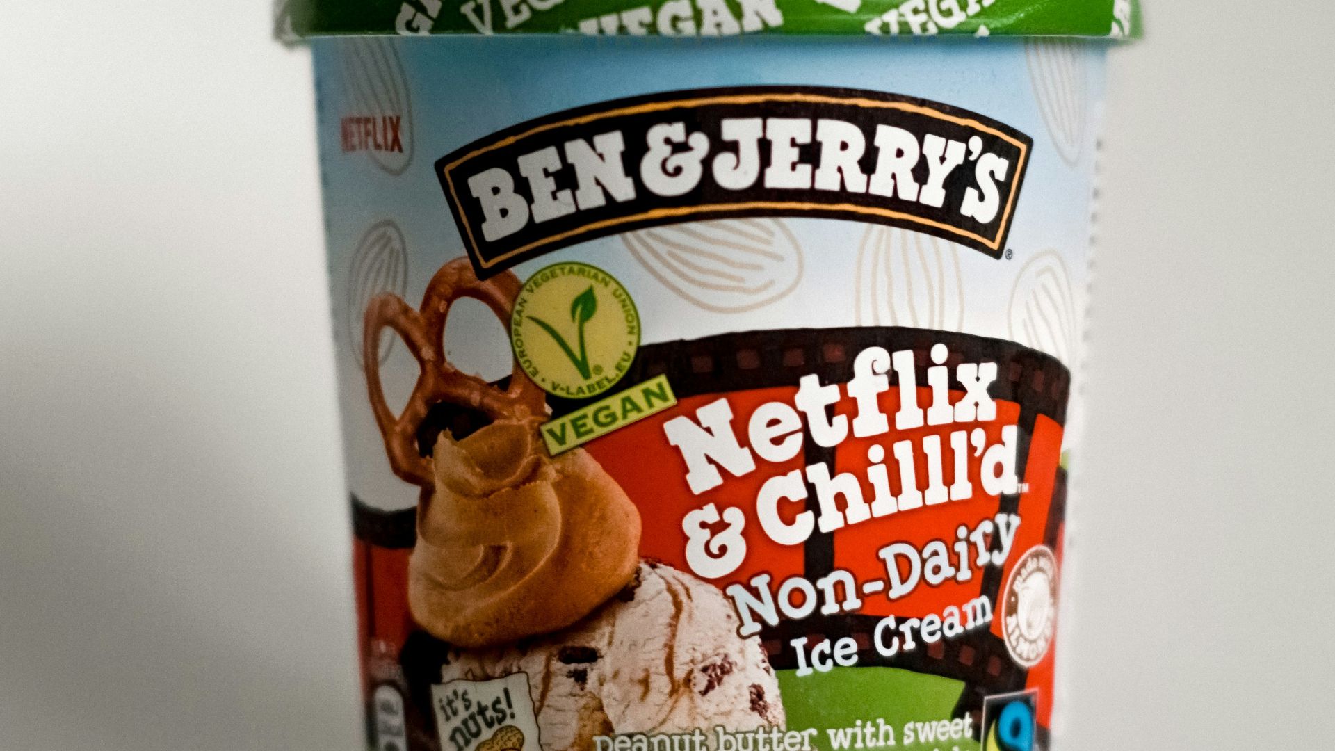 a cup of ice cream sitting on top of a table