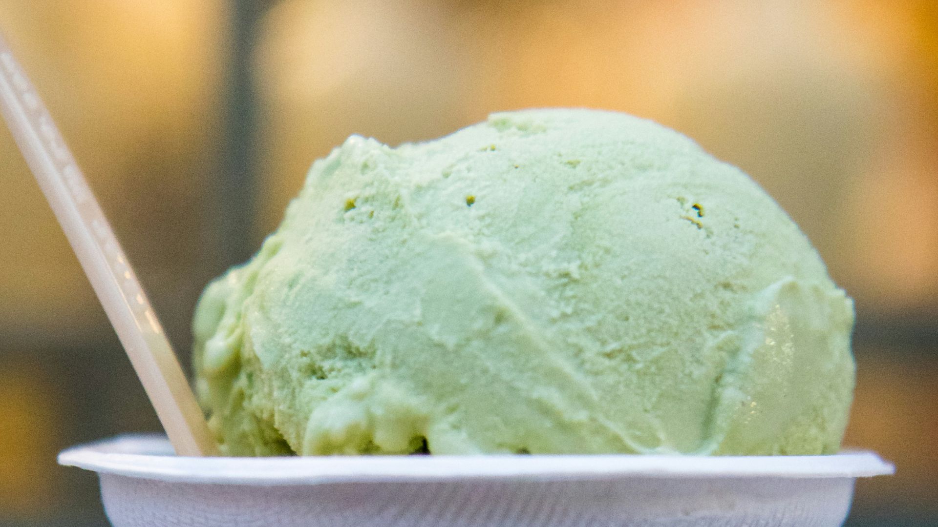 selective focus photo of cup of ice cream
