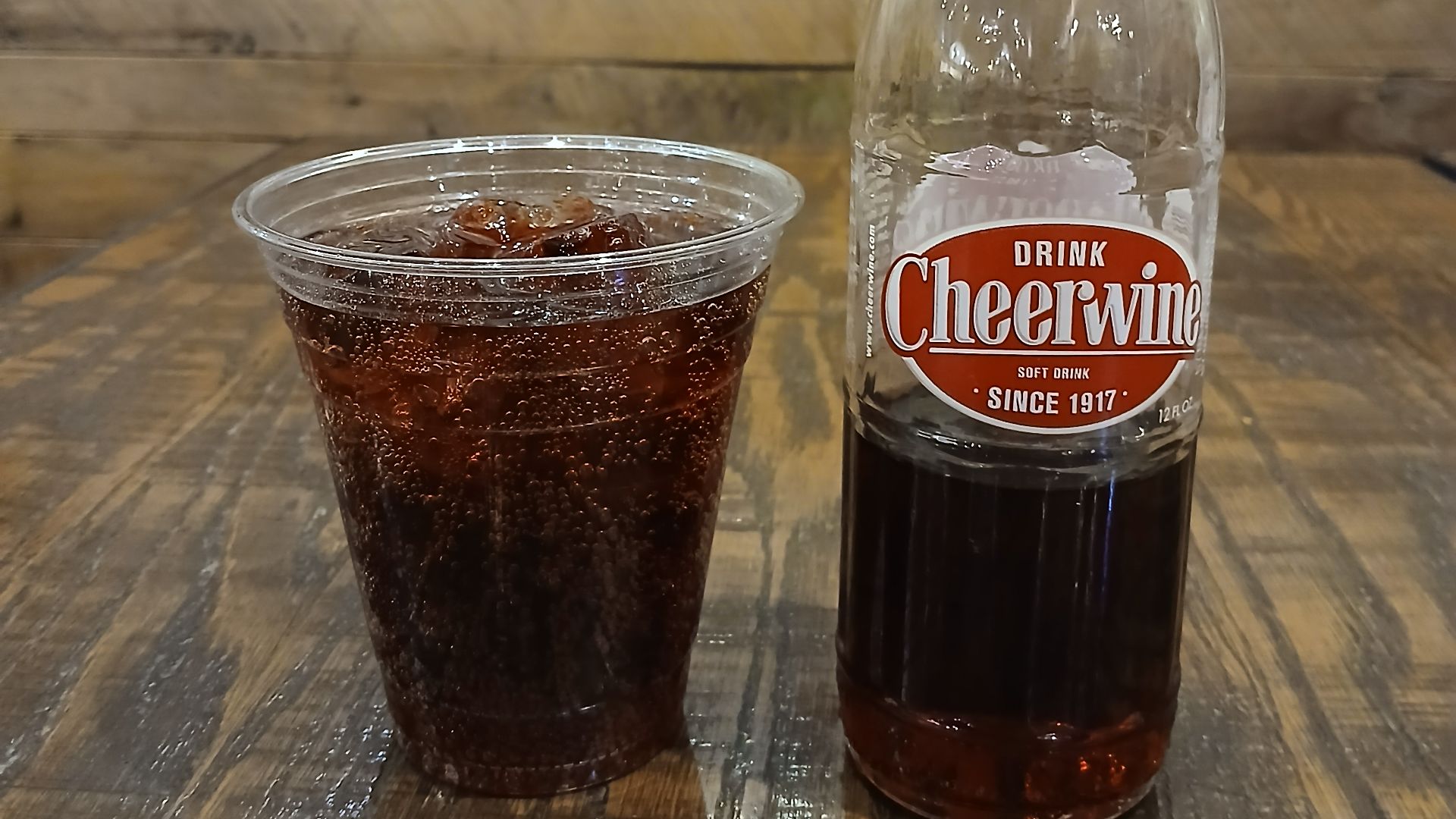 File:Bottle and plastic cup of Cheerwine at dinner.jpg
