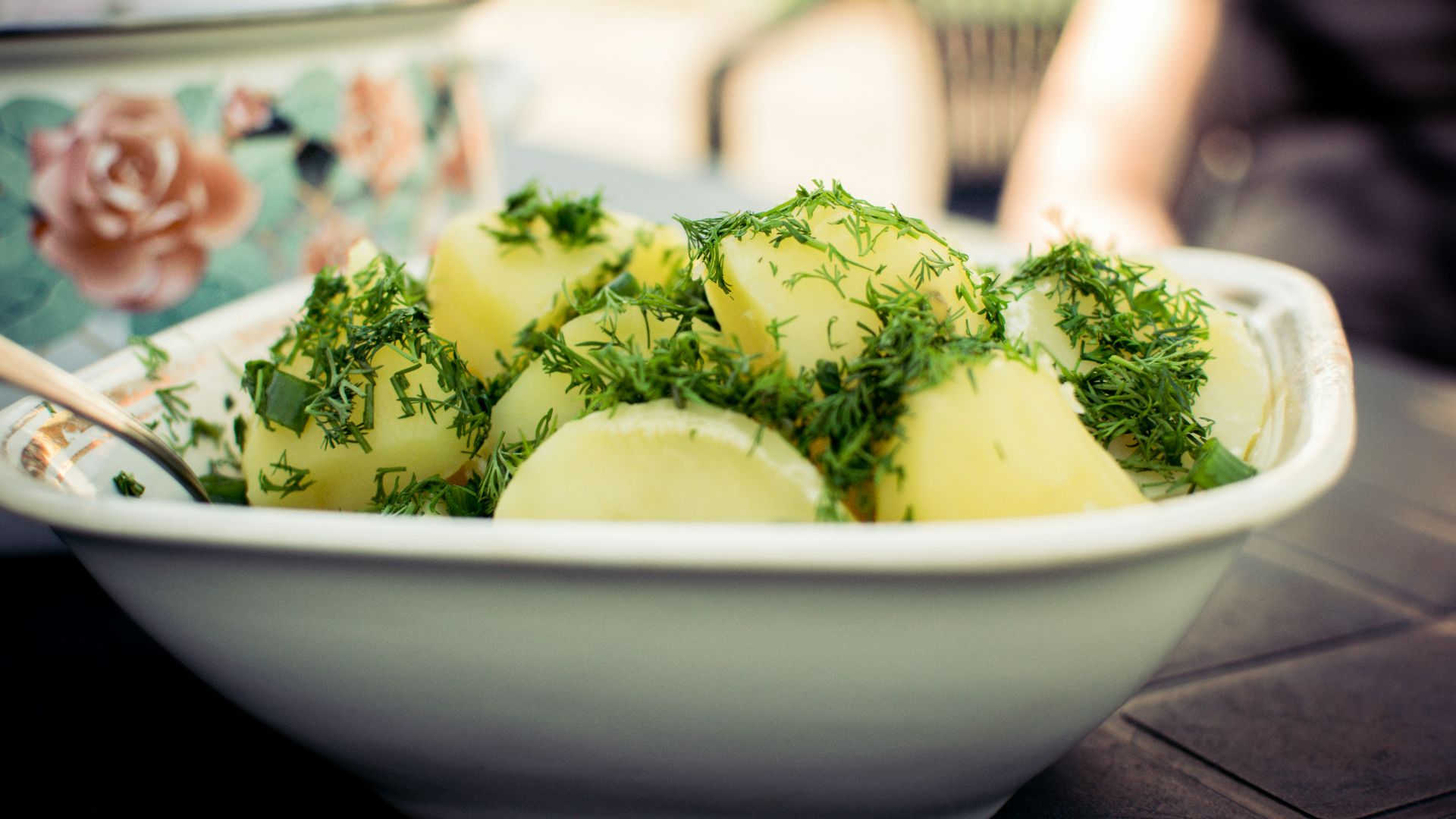 sliced cucumber on white ceramic bowl