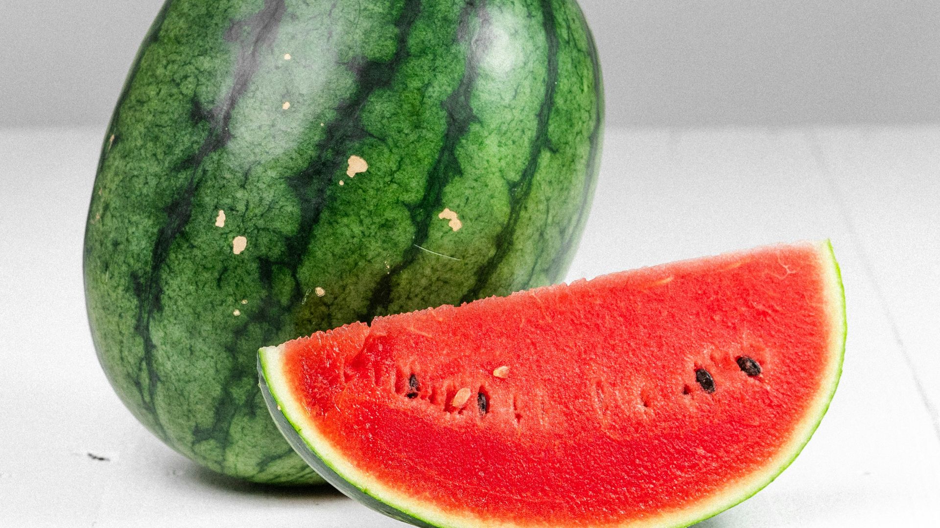 watermelon fruit on white table