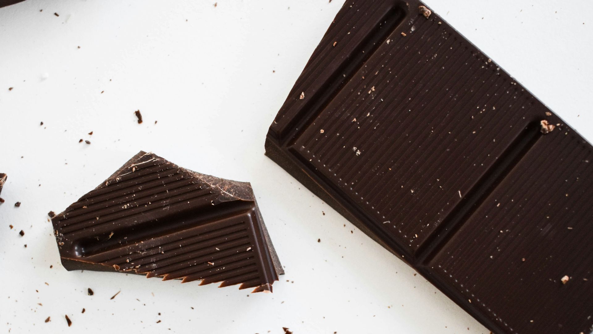 four pieces of chocolate sitting on top of each other