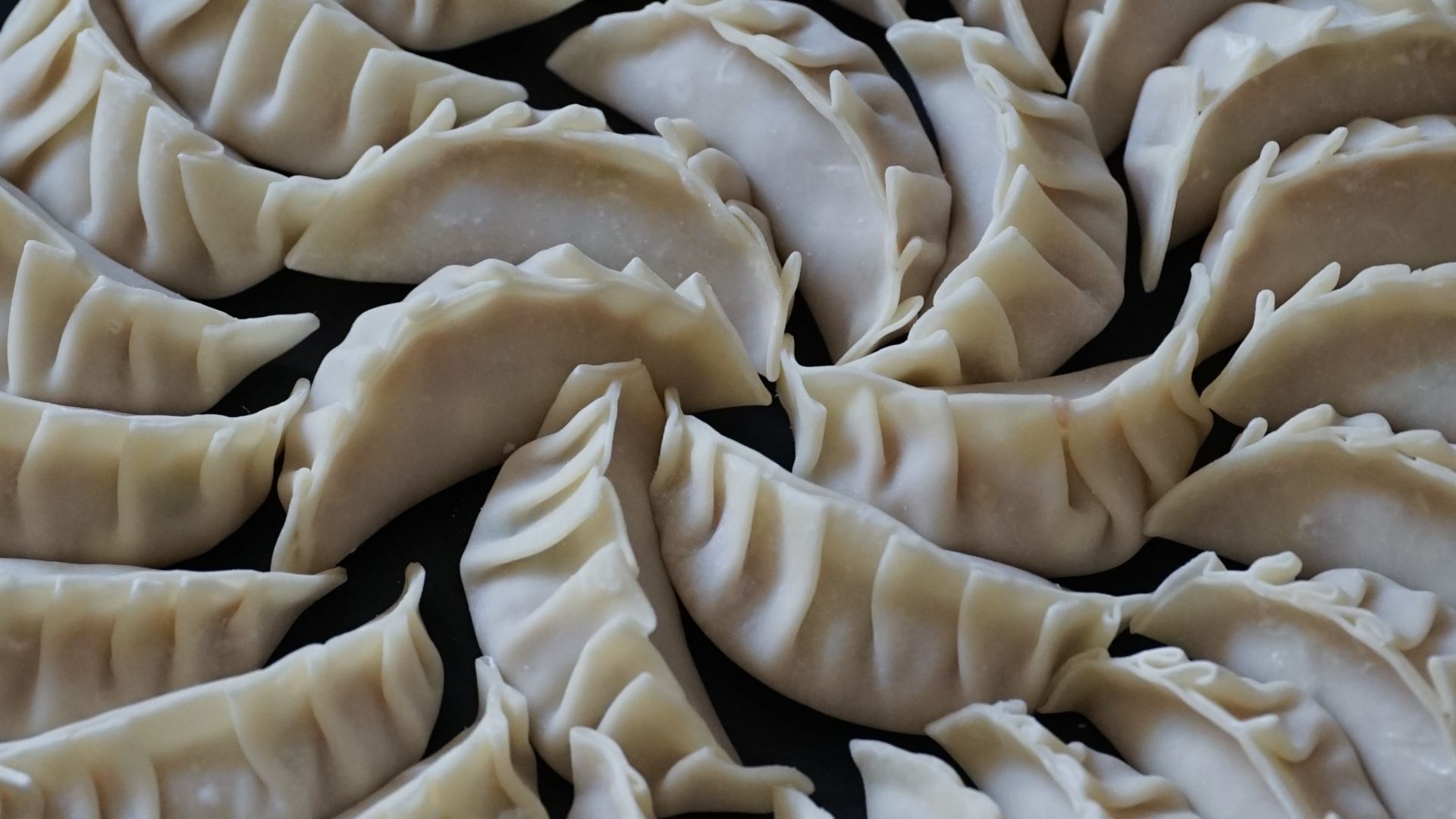 white and black round ceramic plate