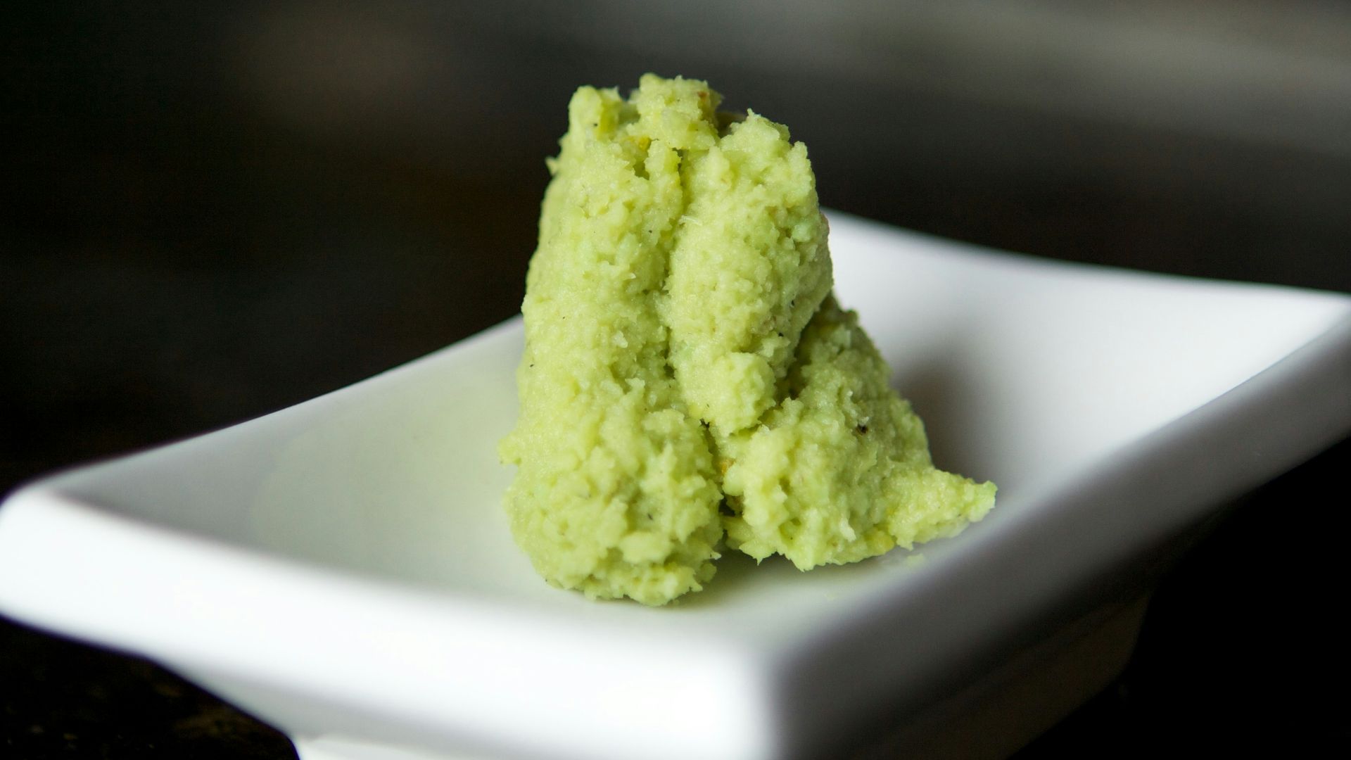 green powder on white ceramic plate