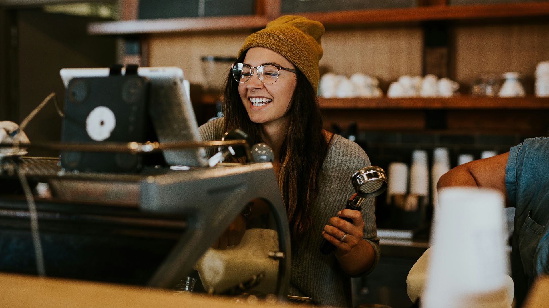 woman holding magnifying glass