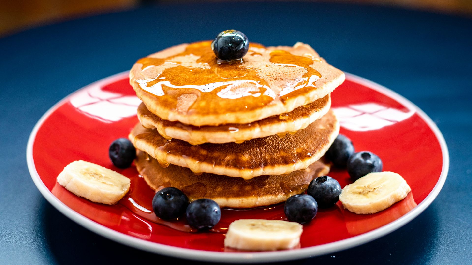 baked pancake with blueberry and slice of banan