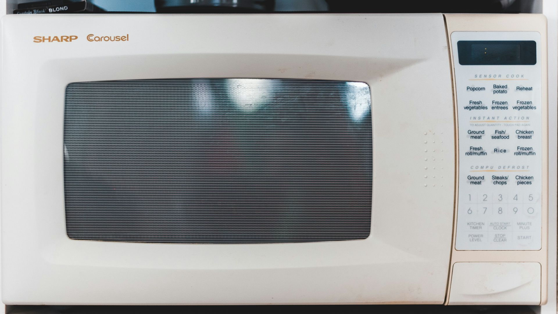 white microwave oven turned off
