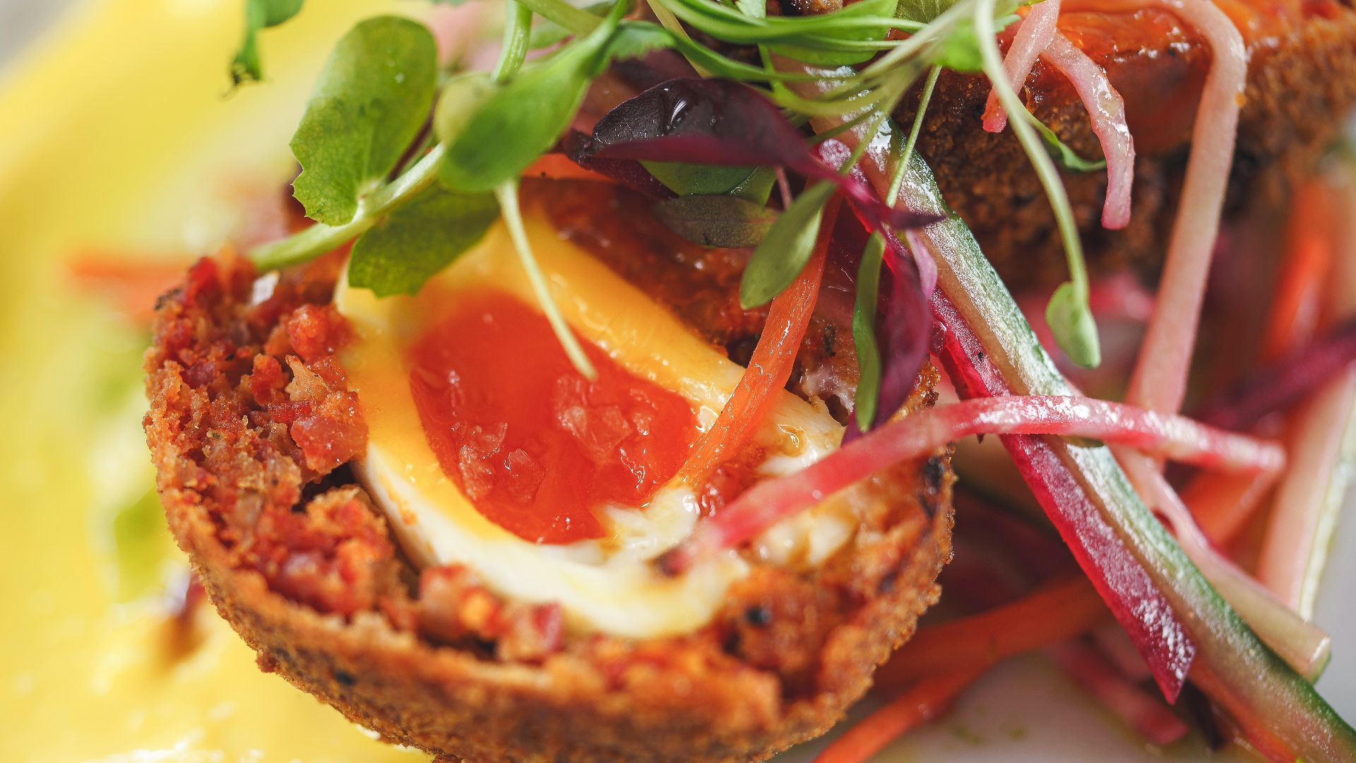 a close up of a plate of food on a table