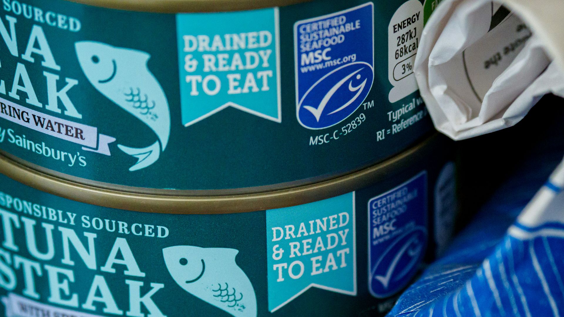 blue and white labeled can