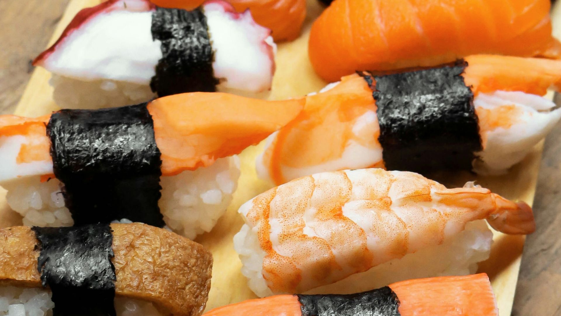 sushi on wooden platter