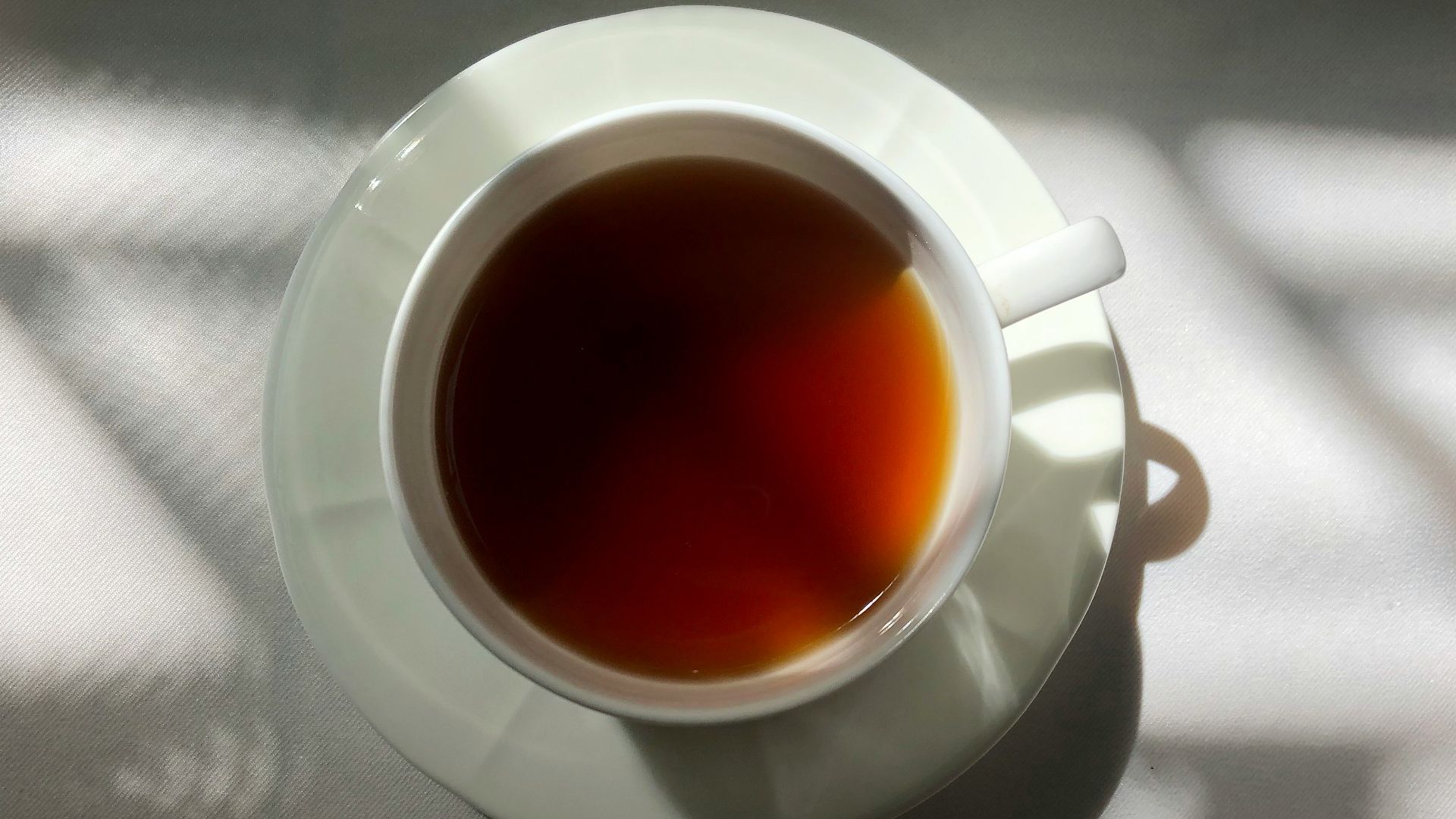 a cup of tea sitting on top of a table