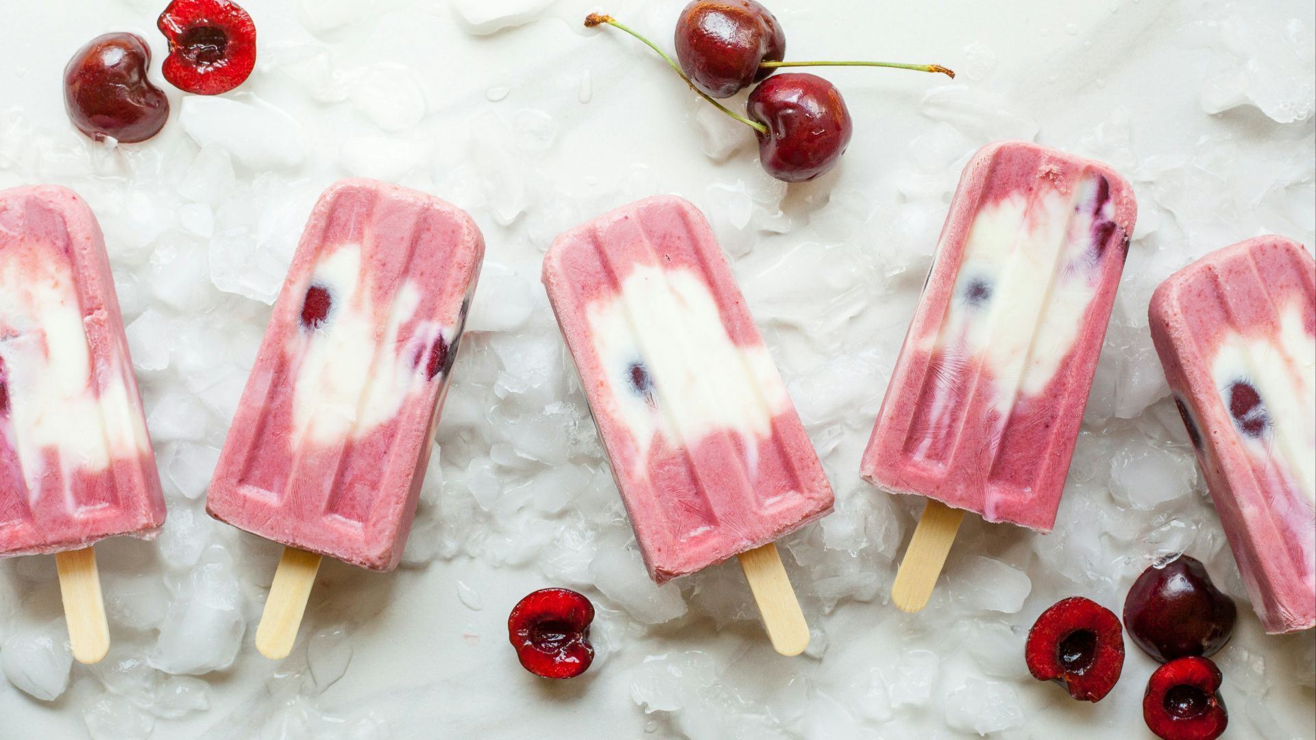 pink Popsicle with cherries on ice