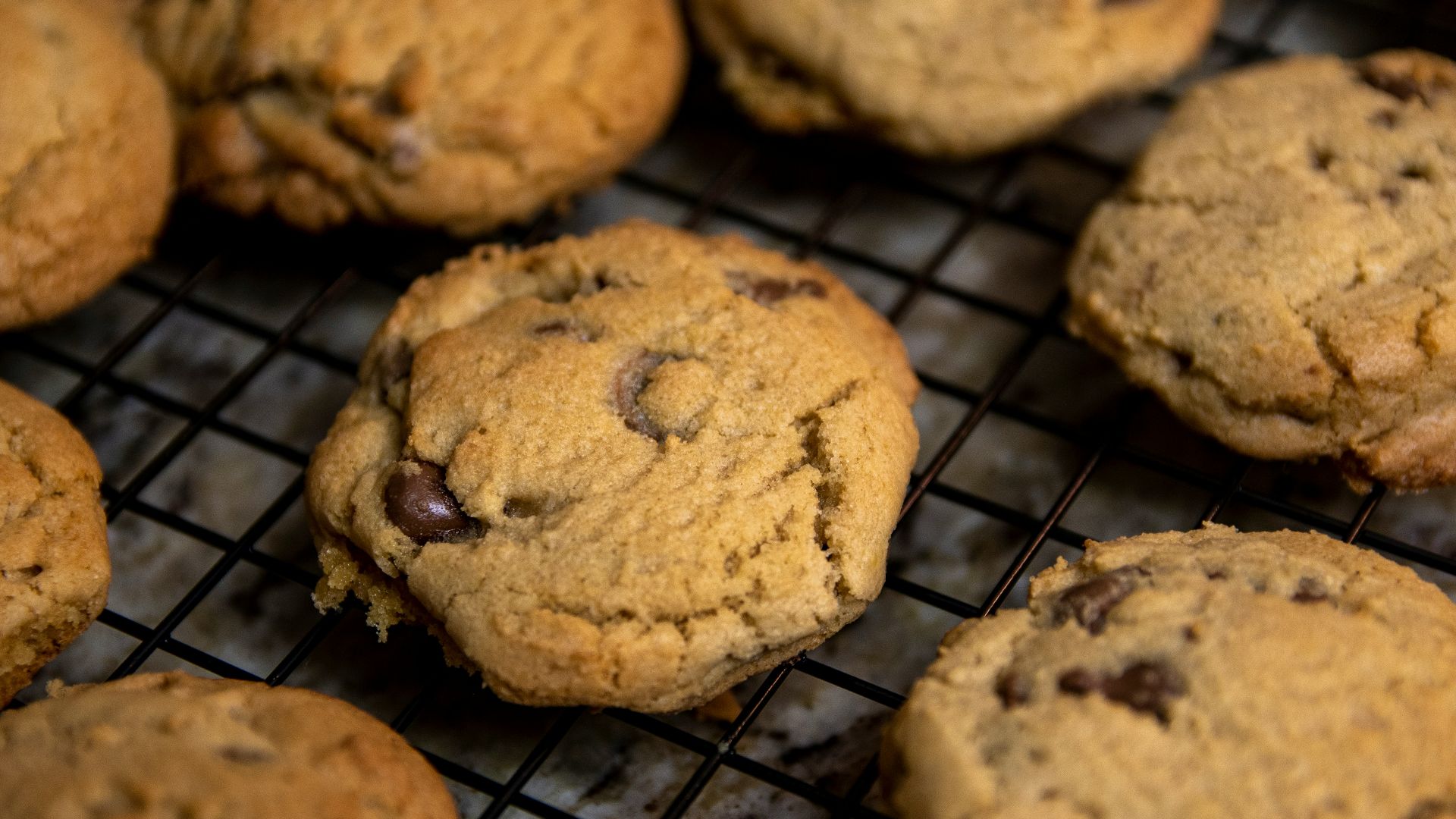 brown cookies on black metal grill