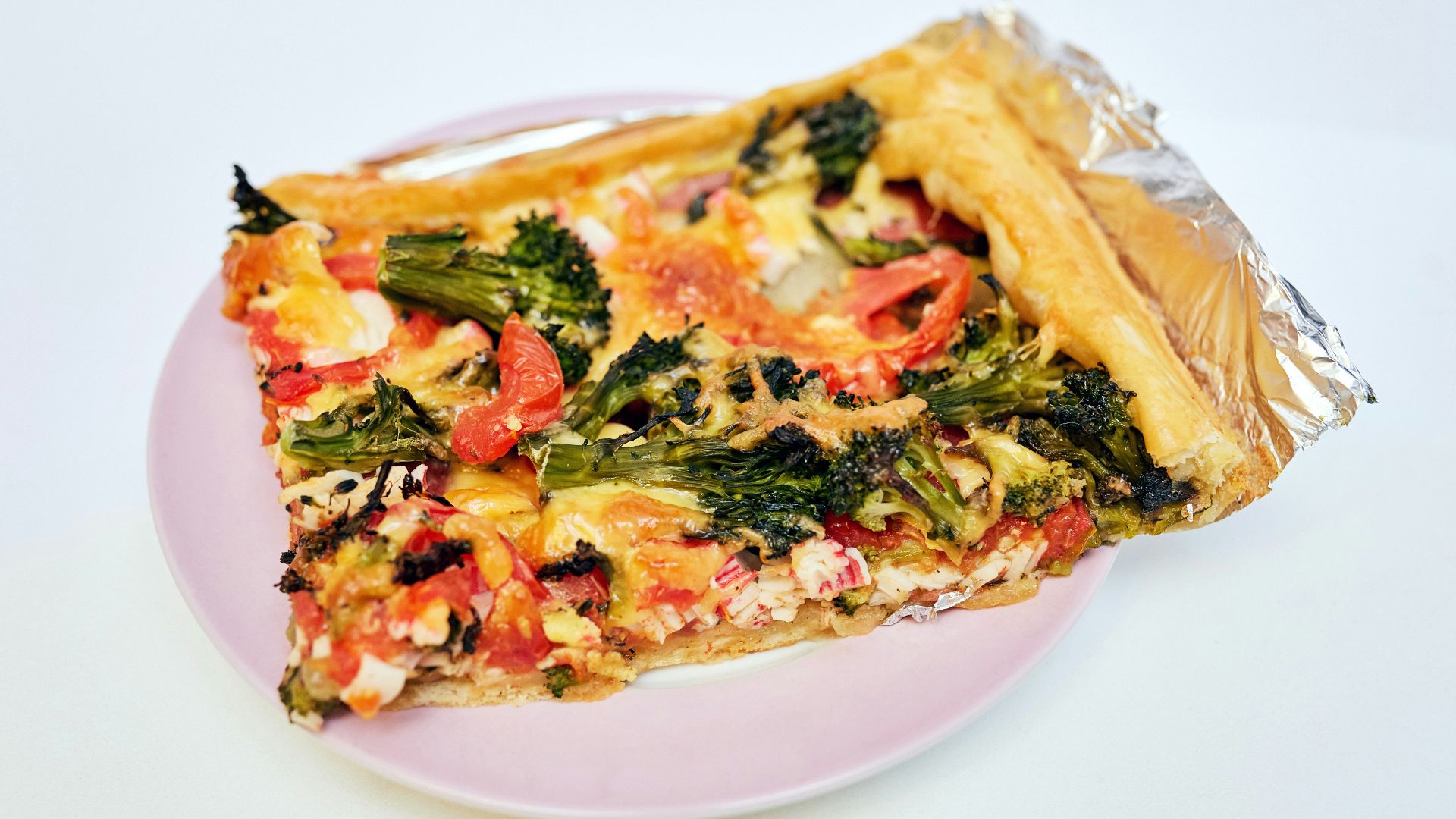 brown and green dish on white ceramic plate