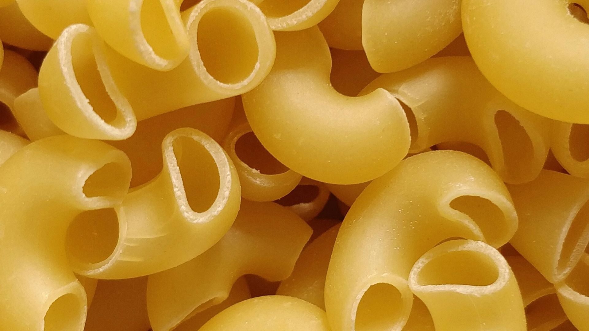 yellow rubber balloons in close up photography
