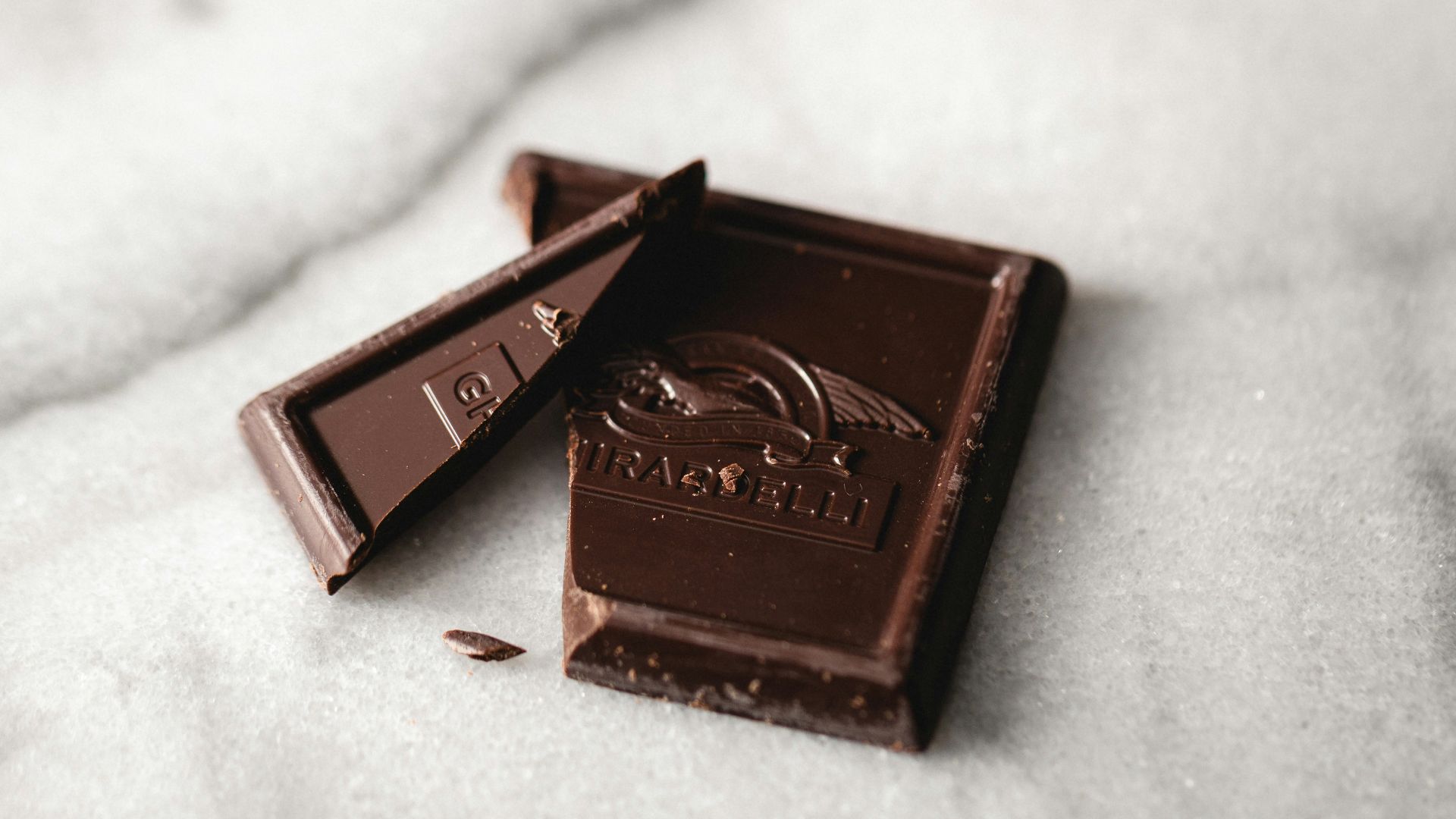 red and white box on white textile