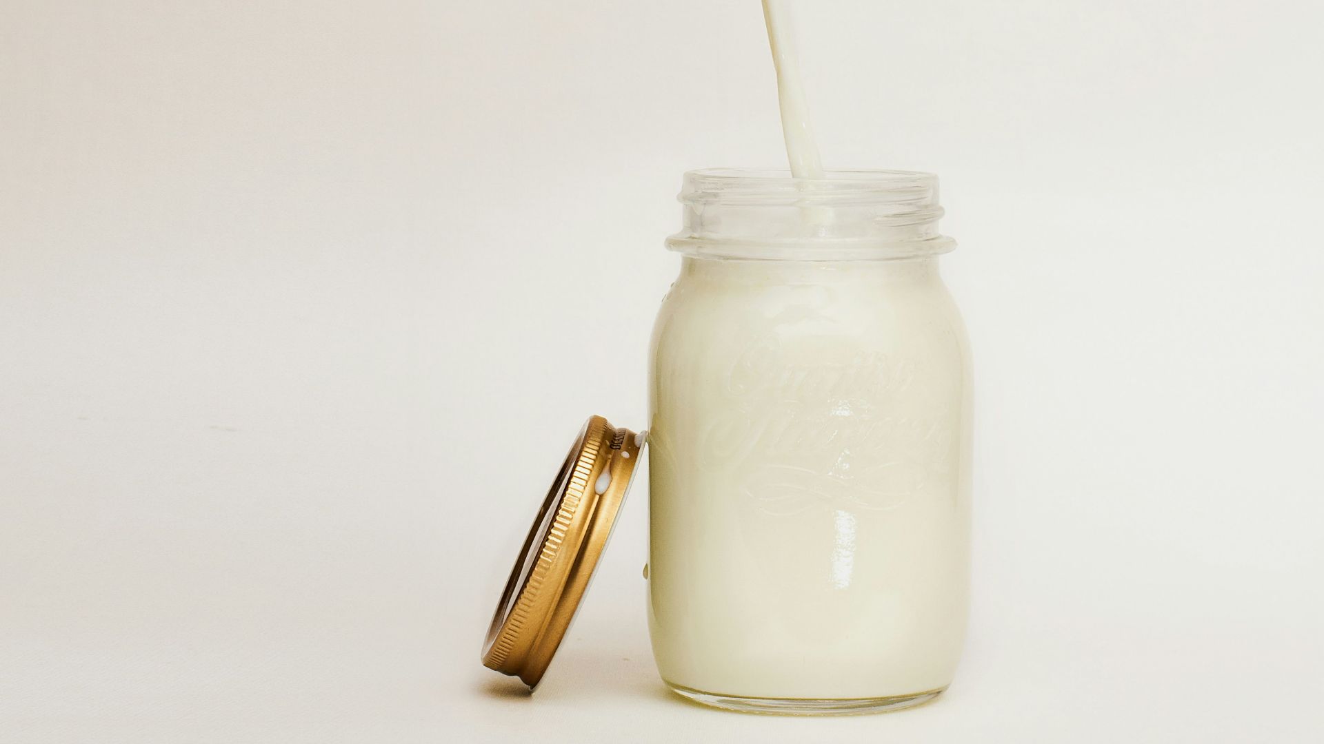 mason jar filled with smoothie