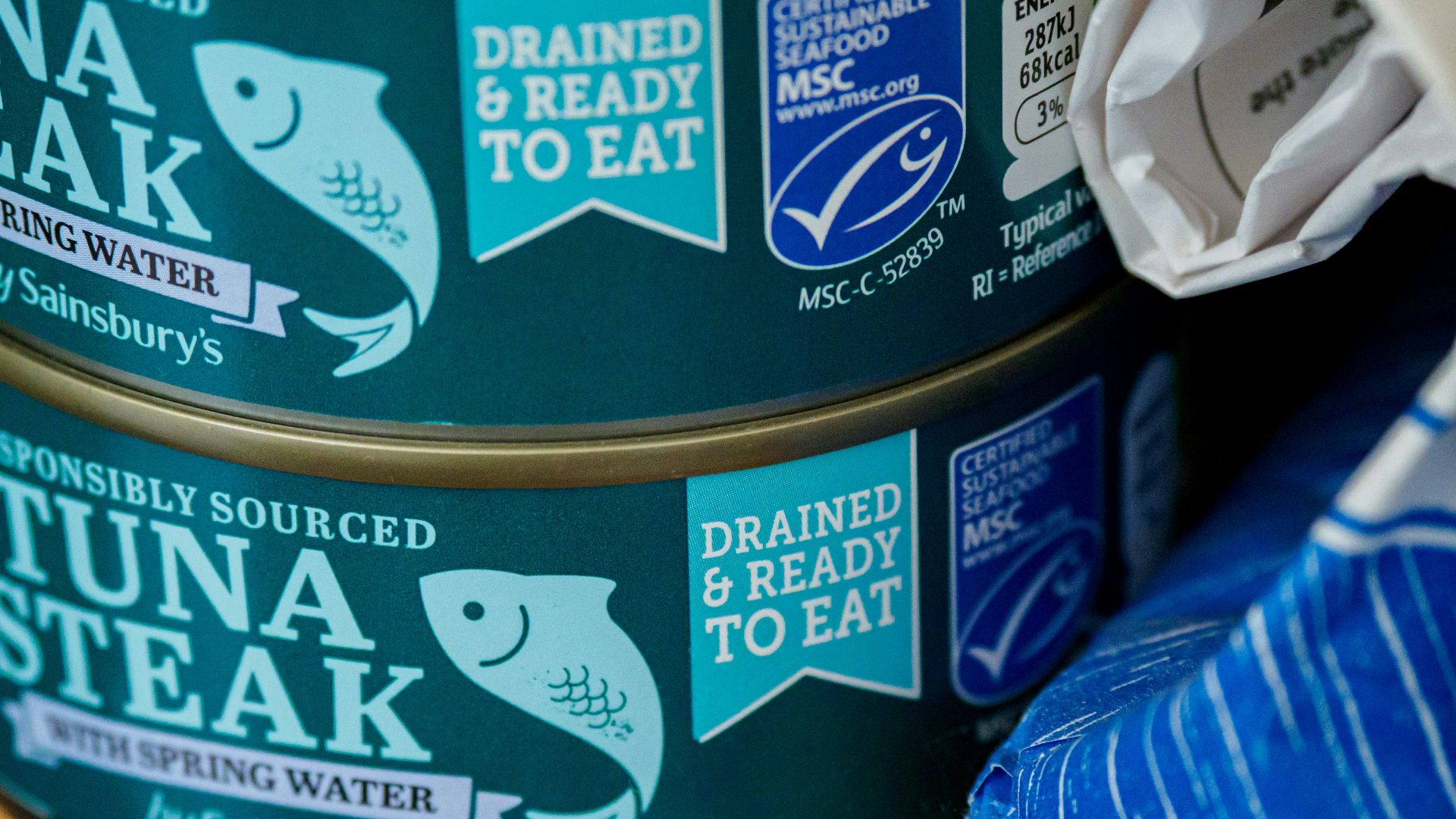 blue and white labeled can