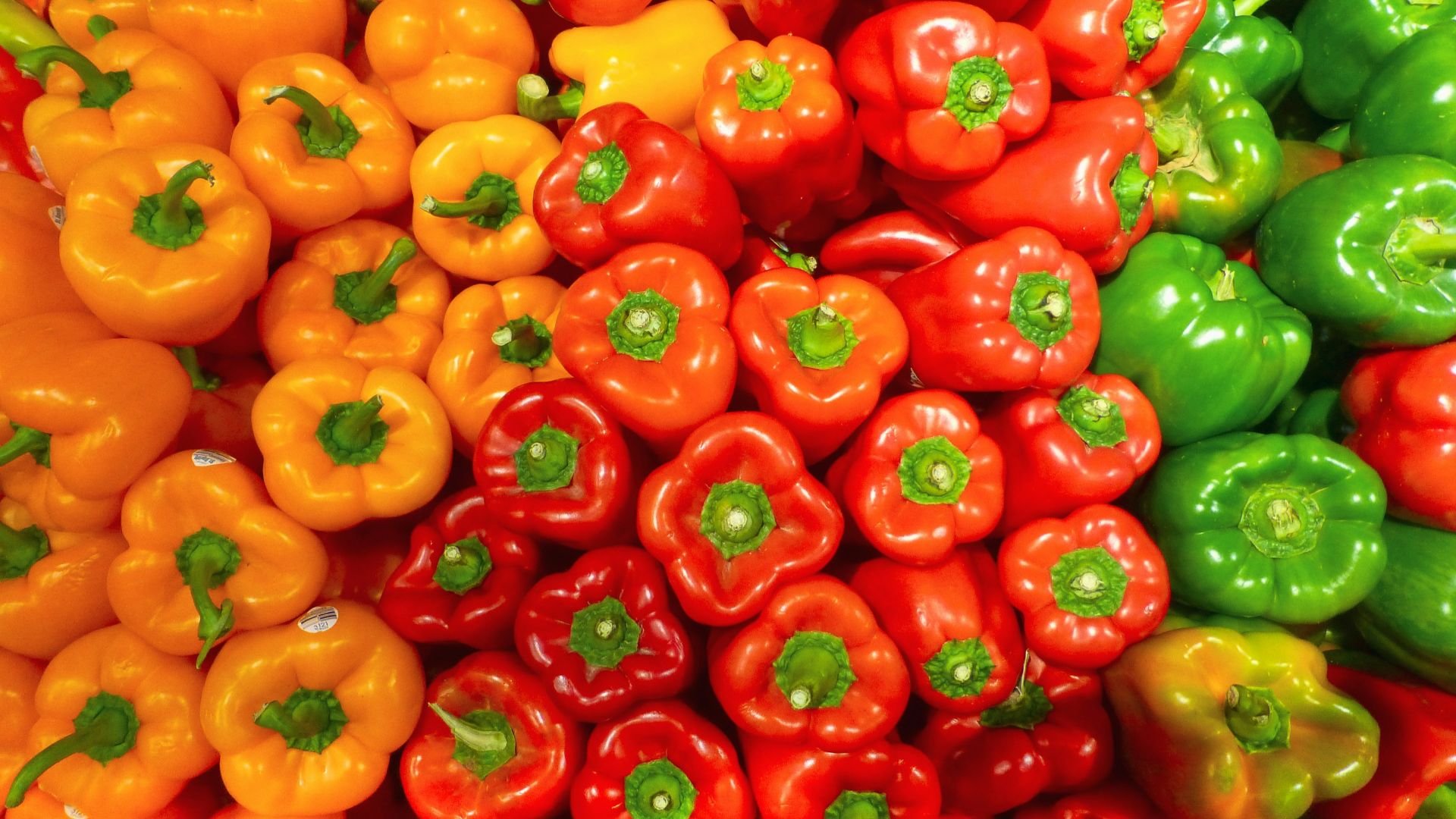 orange bell peppers on white ceramic plate