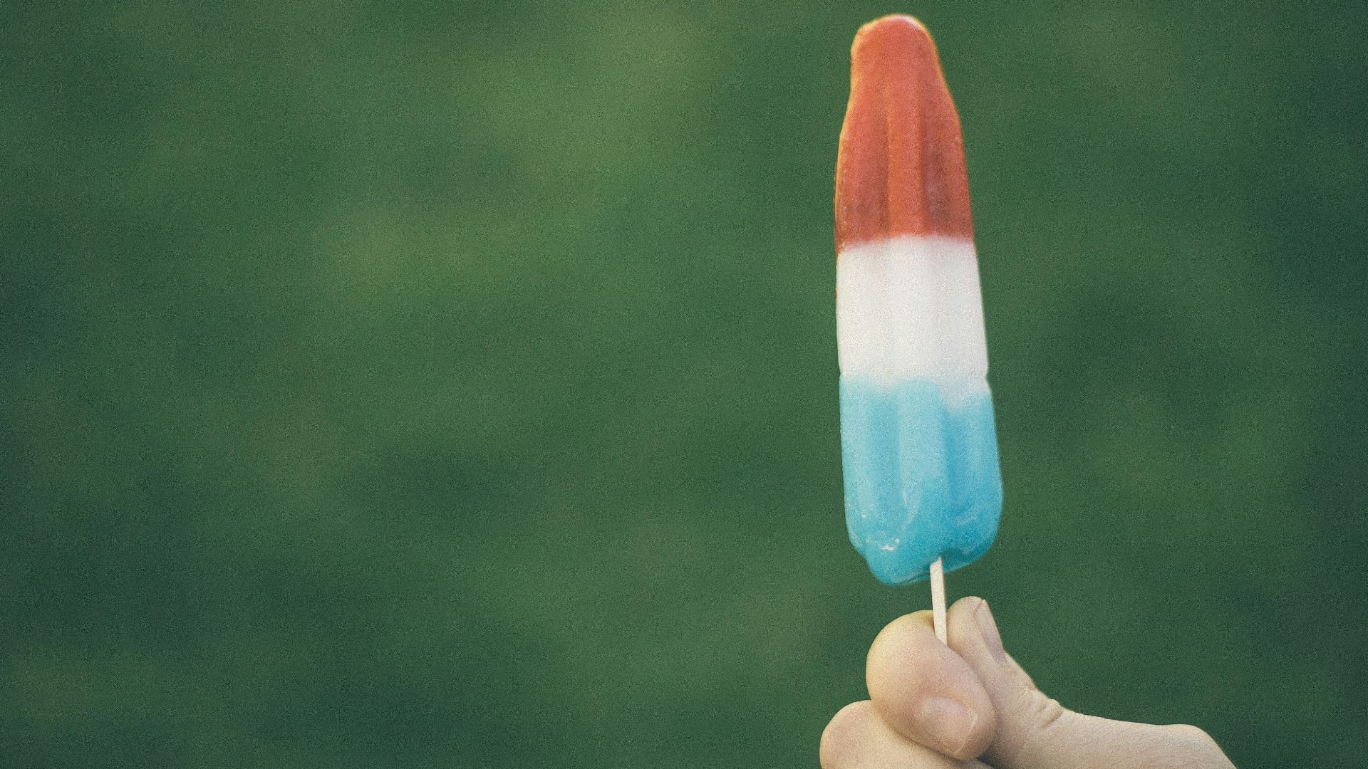 person holding ice pop