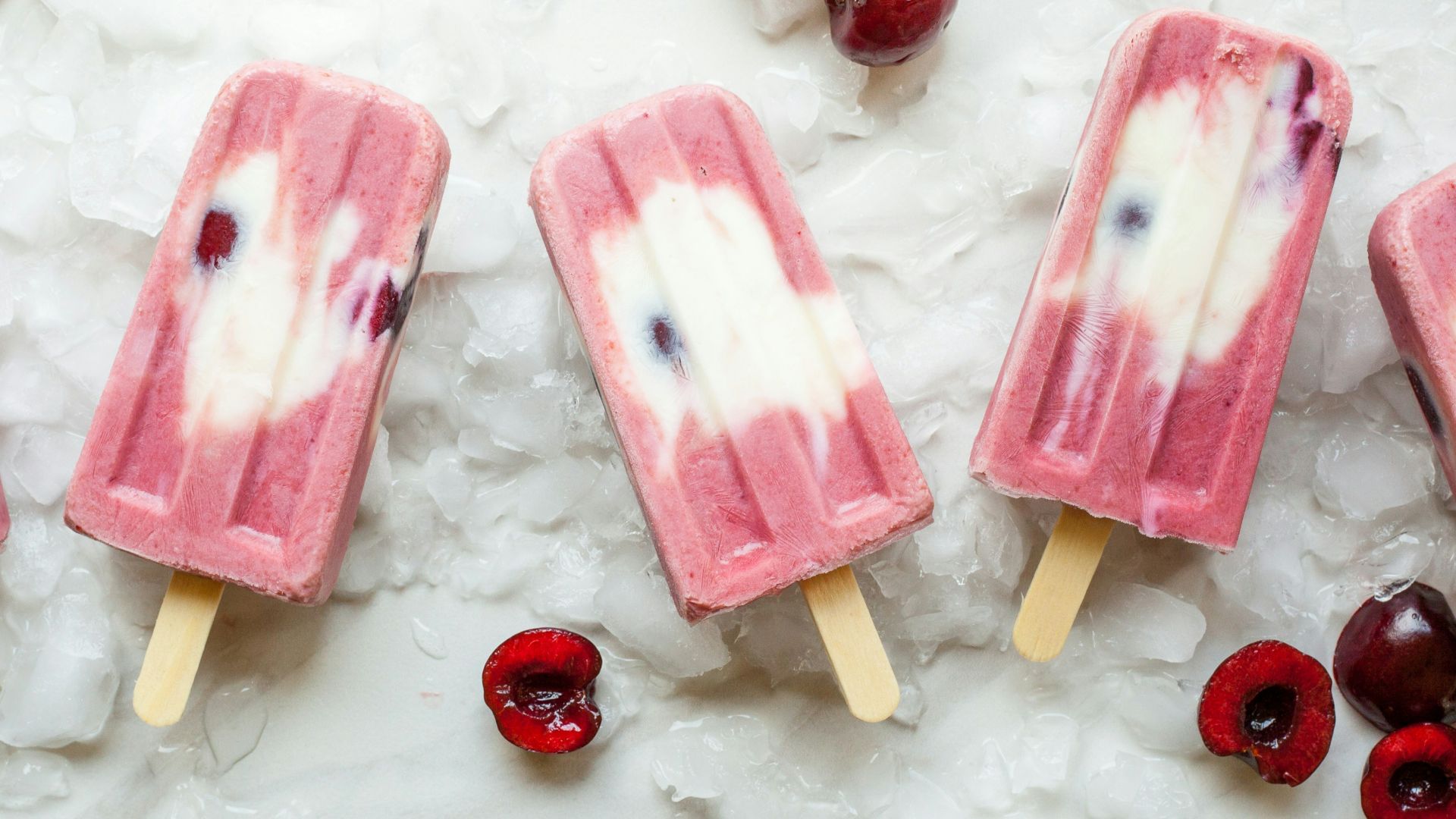 pink Popsicle with cherries on ice