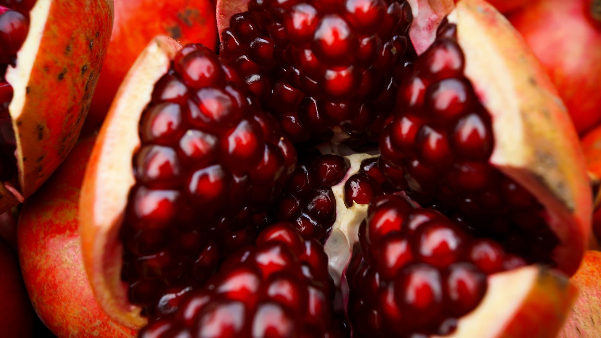 close-up photo of sliced pomegranate