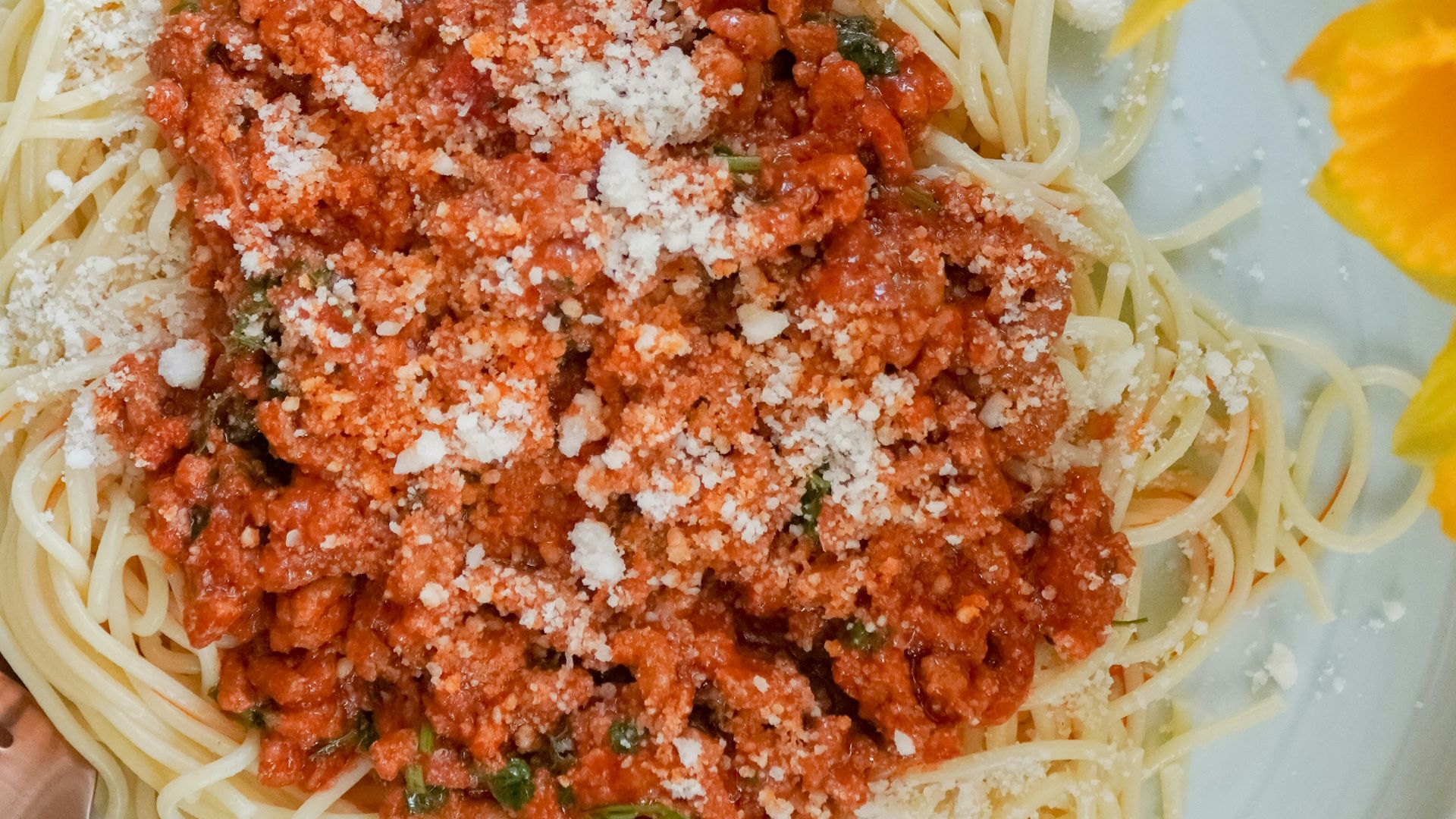 pasta with sauce on white ceramic plate