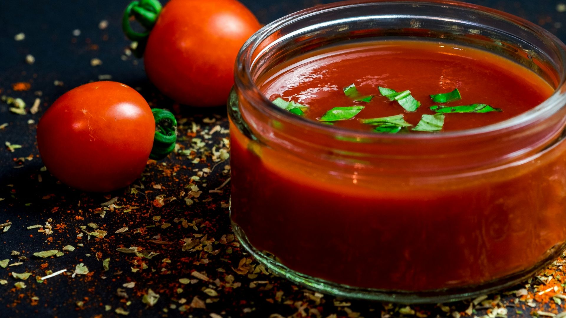 tomato and tomato puree with parsley in bowl