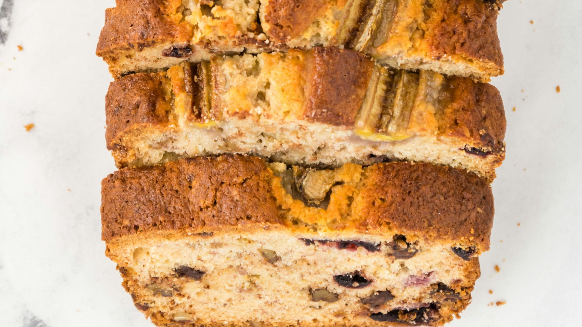 bread with butter on white paper