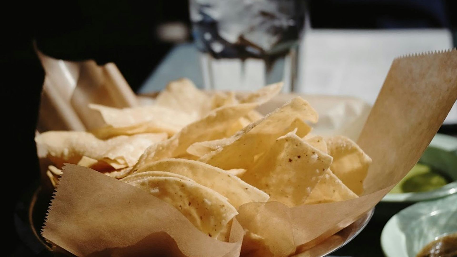 brown and white ceramic bowl on black table