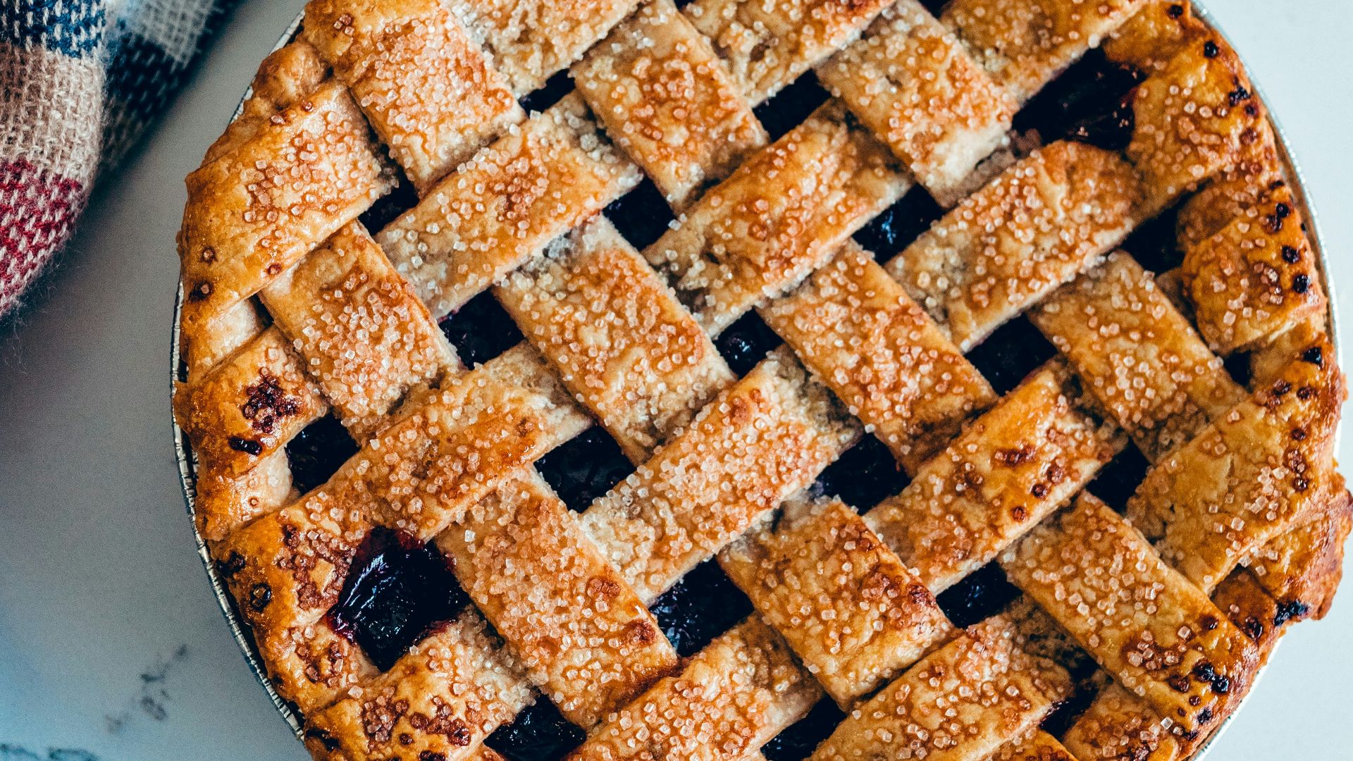 brown round woven basket on white table