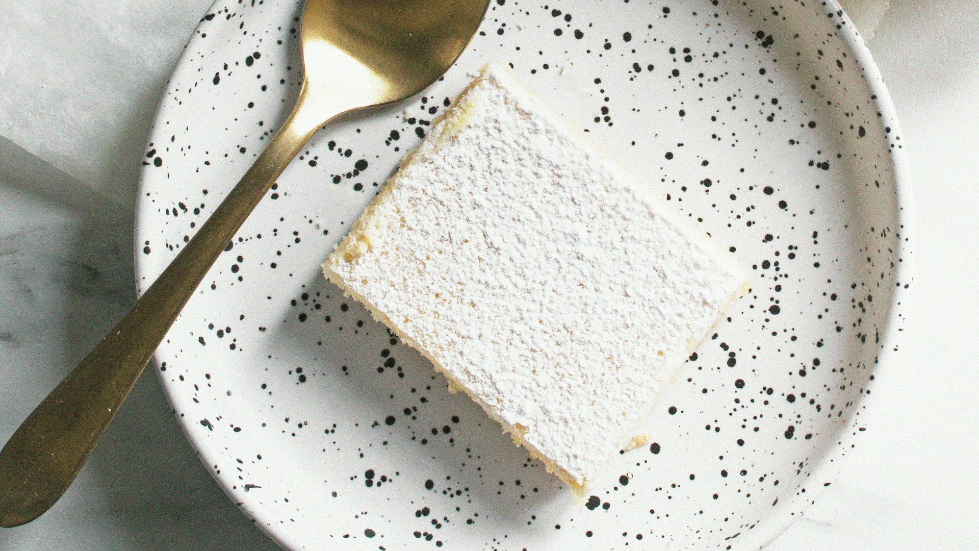 sliced lemon on white ceramic plate