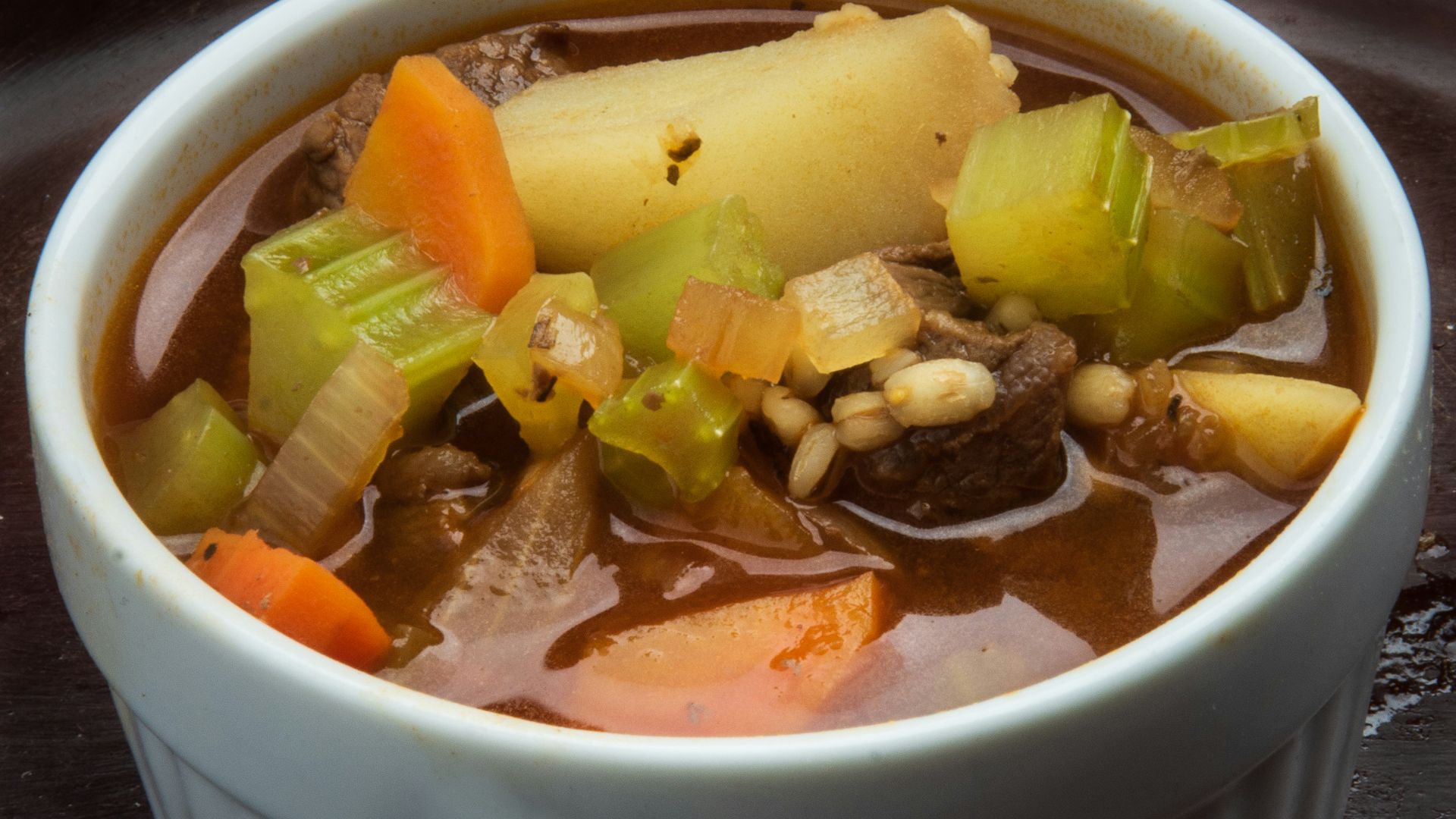 white ceramic bowl with sliced fruits
