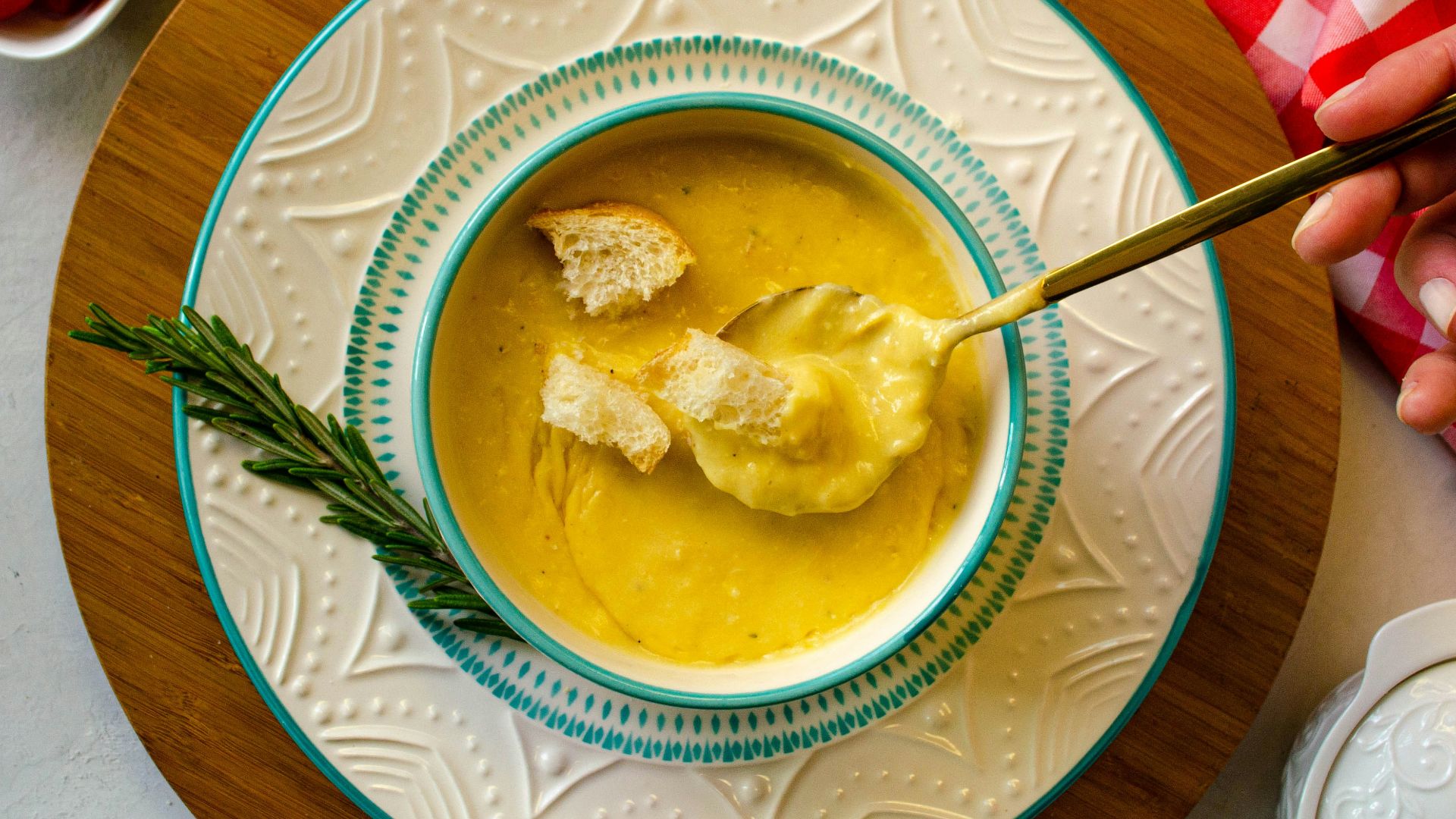 a bowl of soup with a spoon in it