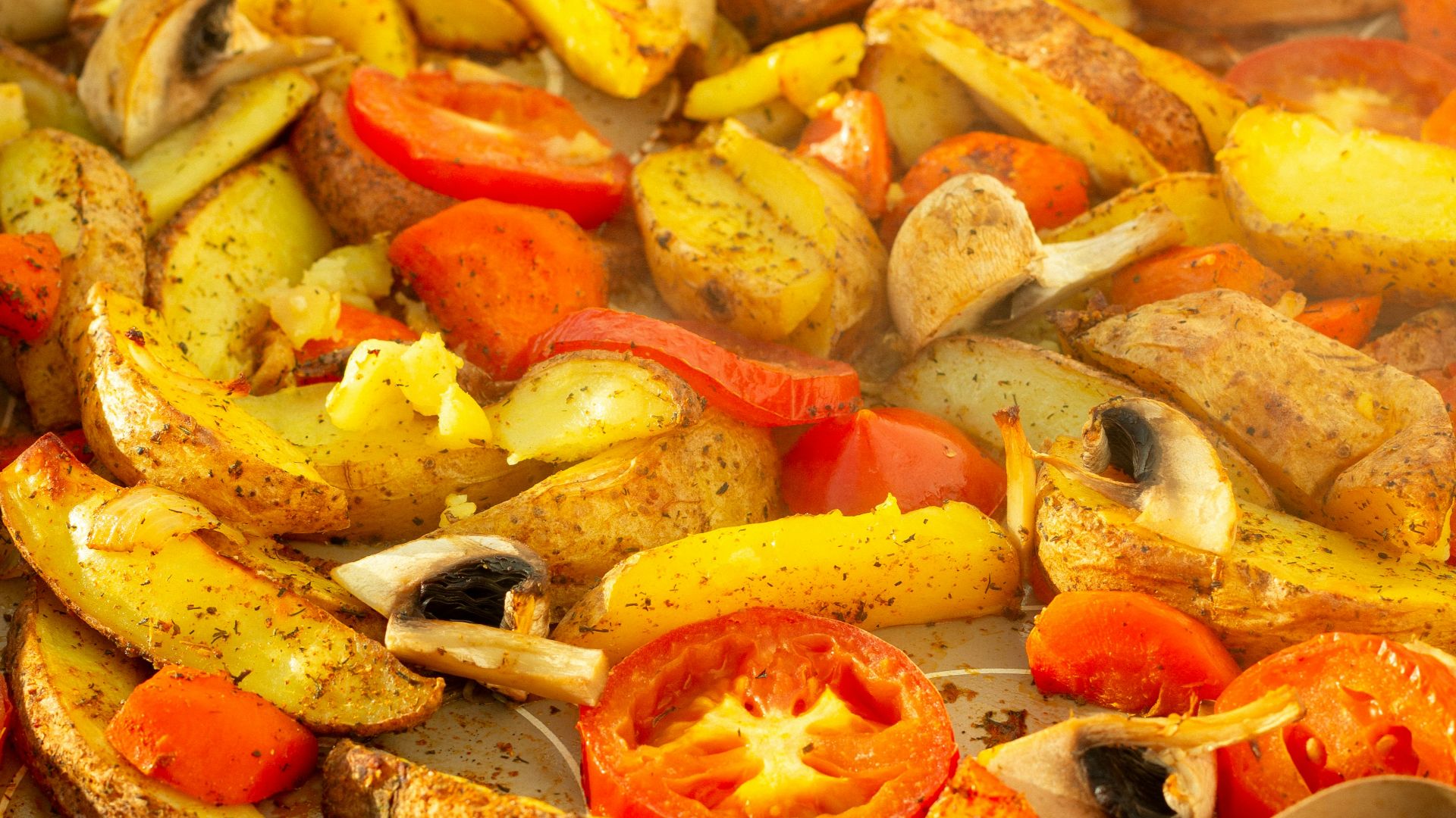 sliced orange fruit on stainless steel tray