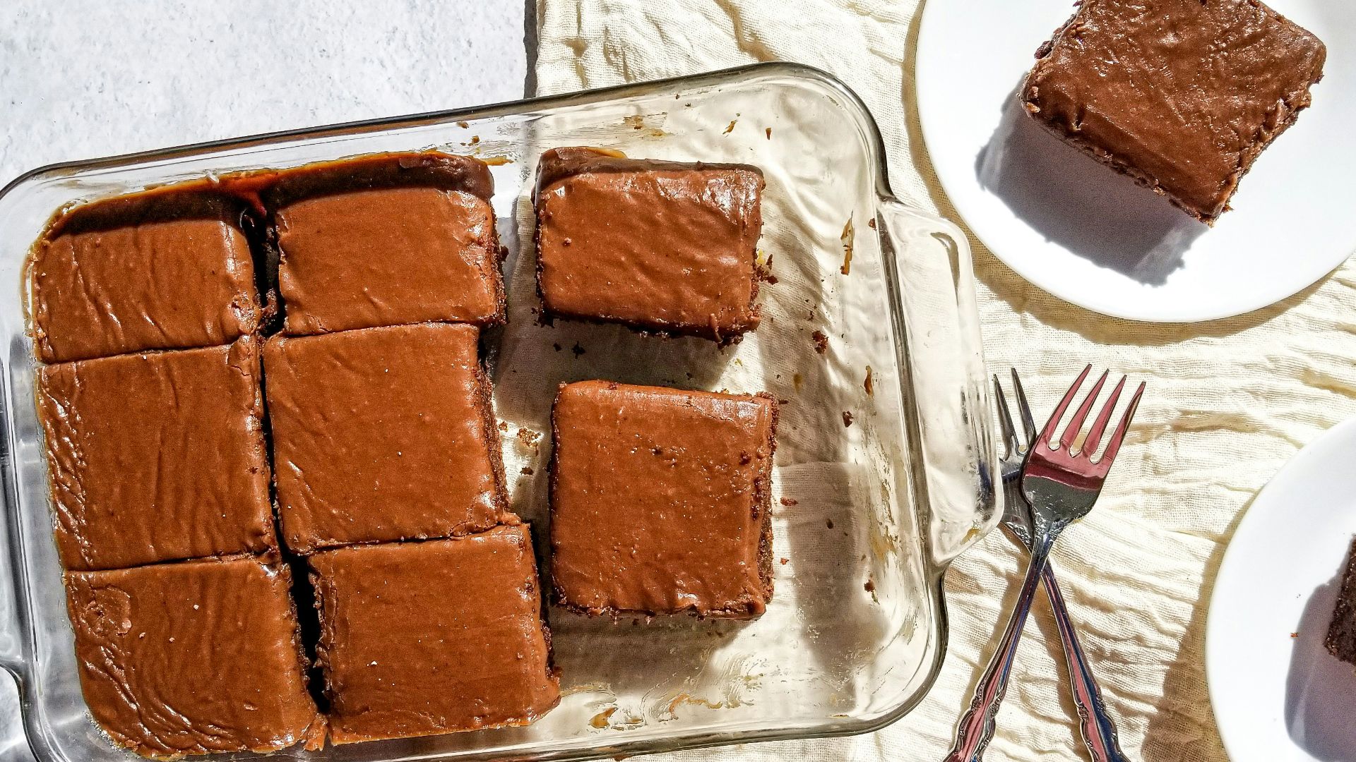 brown cake on white ceramic plate