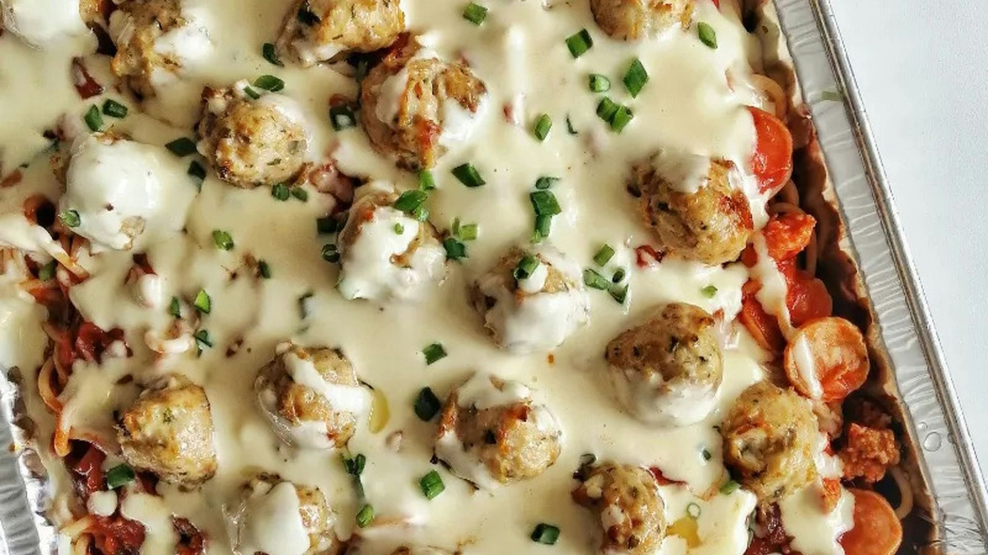 white and brown dish on silver tray
