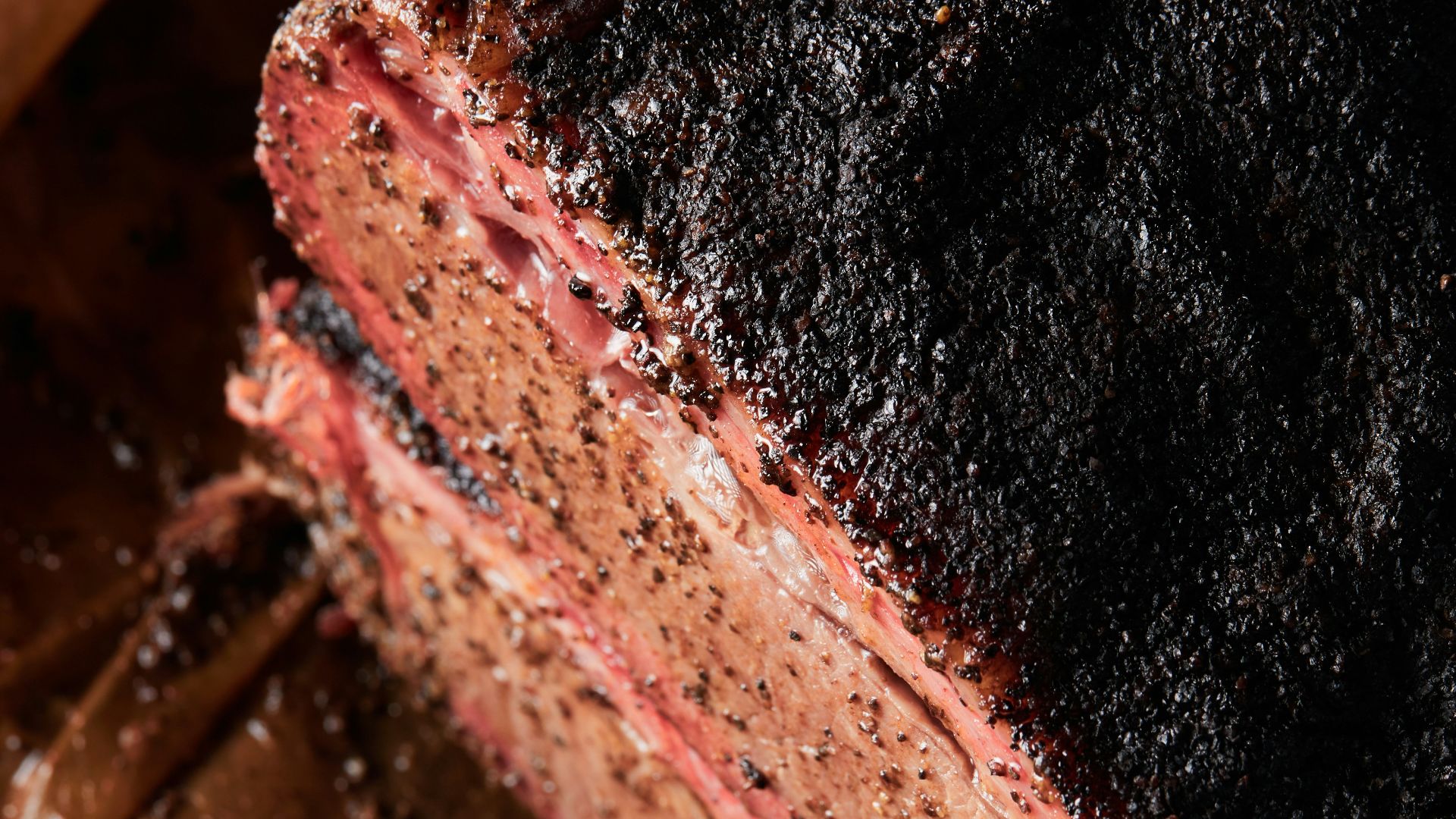 black textile on brown wooden table
