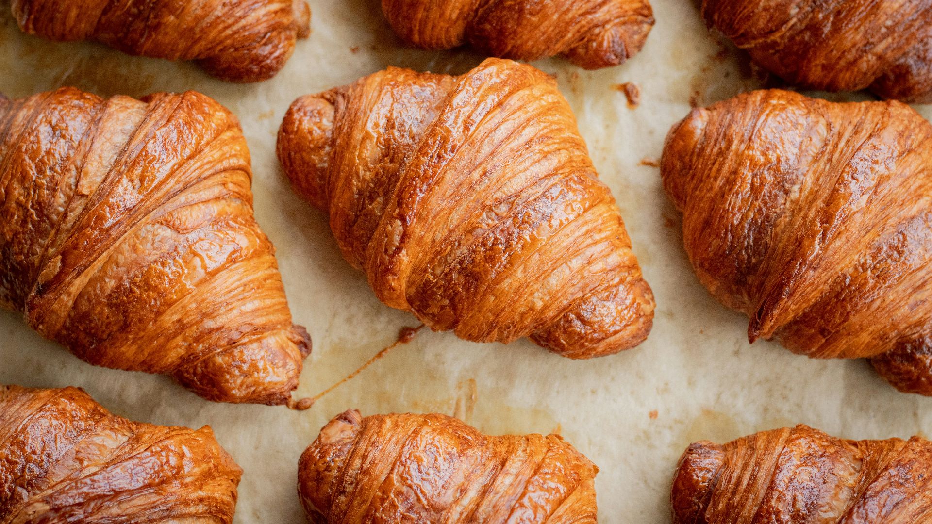 a bunch of croissants that are on a table
