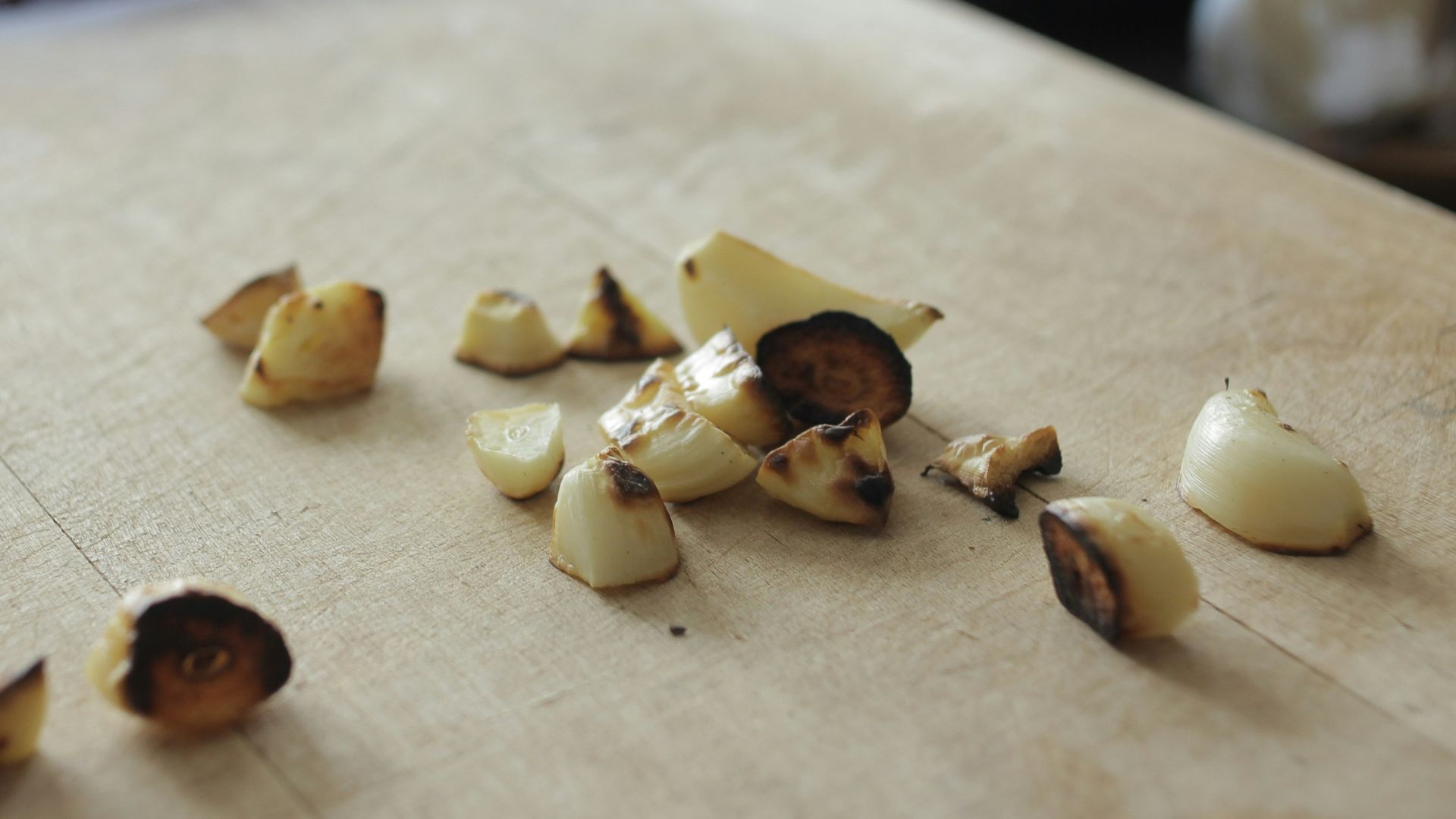 a cutting board with chopped up food on it