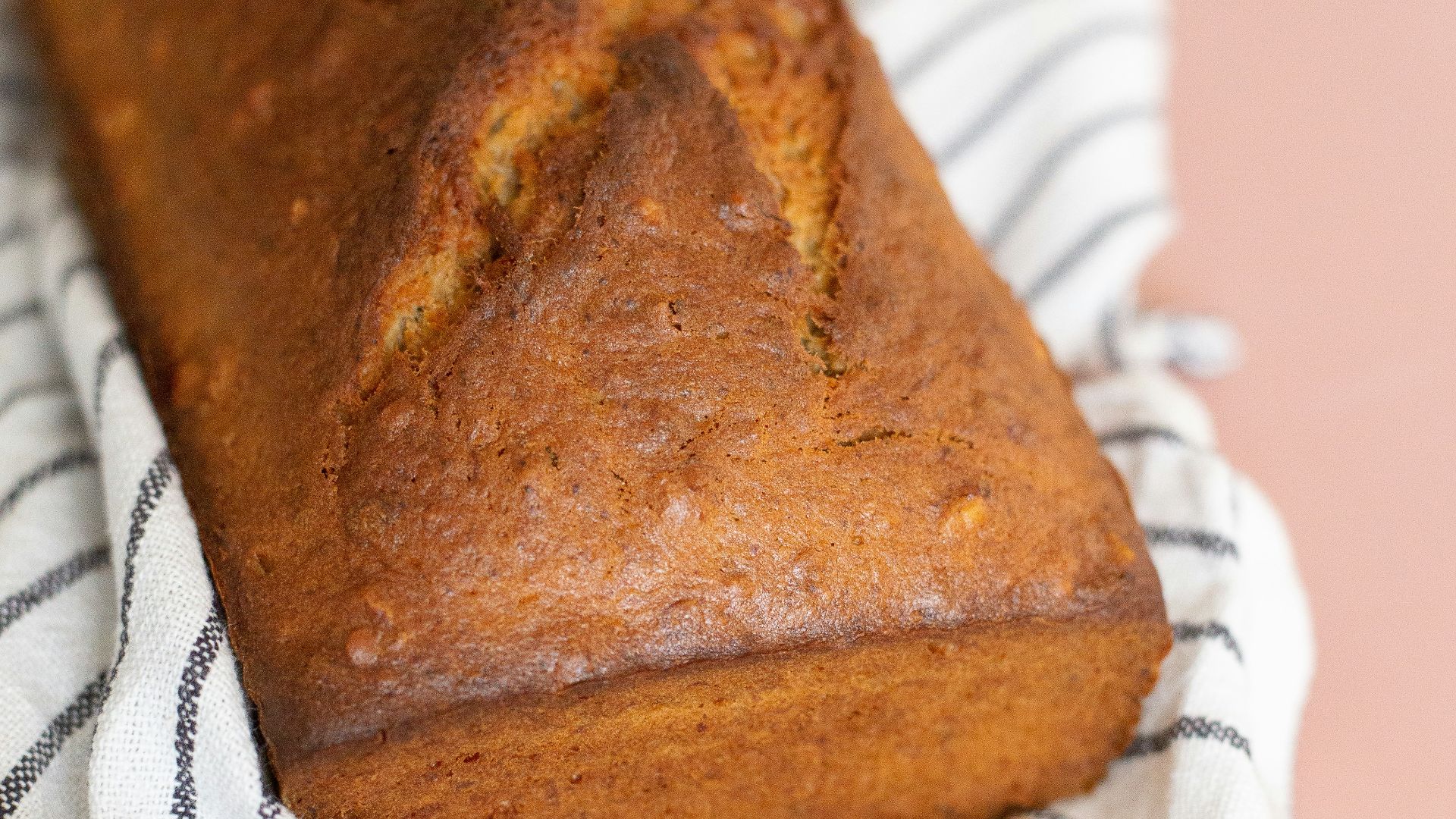 a loaf of bread sitting on top of a towel