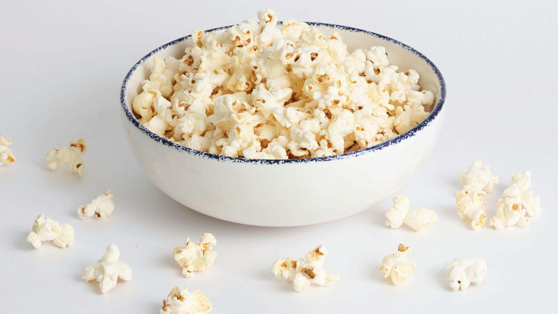 white popcorn in white ceramic bowl