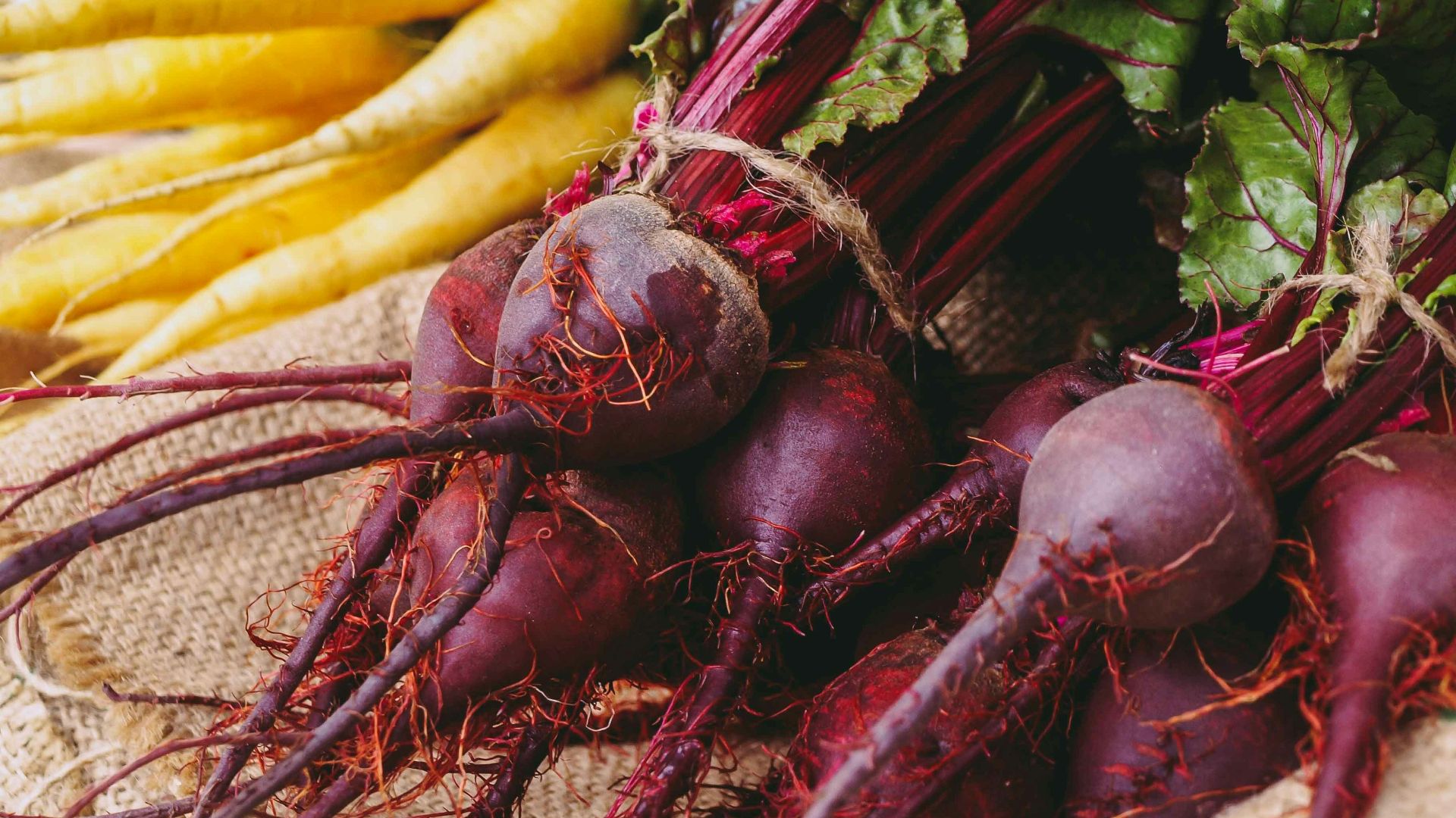 a table topped with lots of different types of vegetables