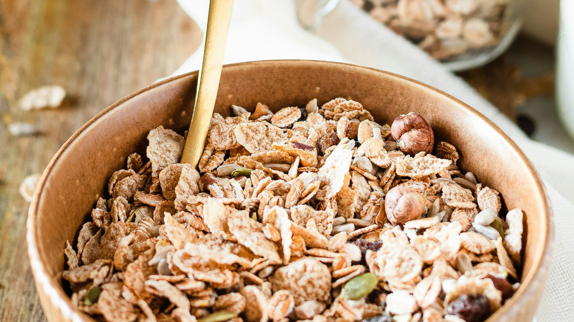 brown wooden bowl with brown wooden spoon