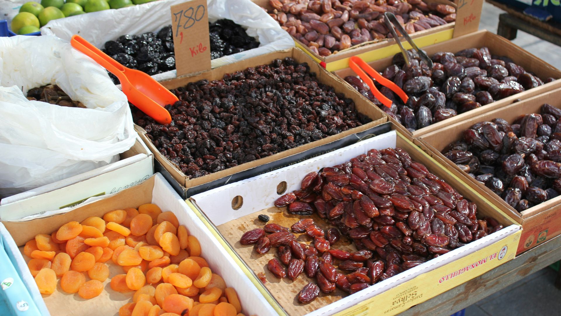 a bunch of boxes filled with different types of fruits