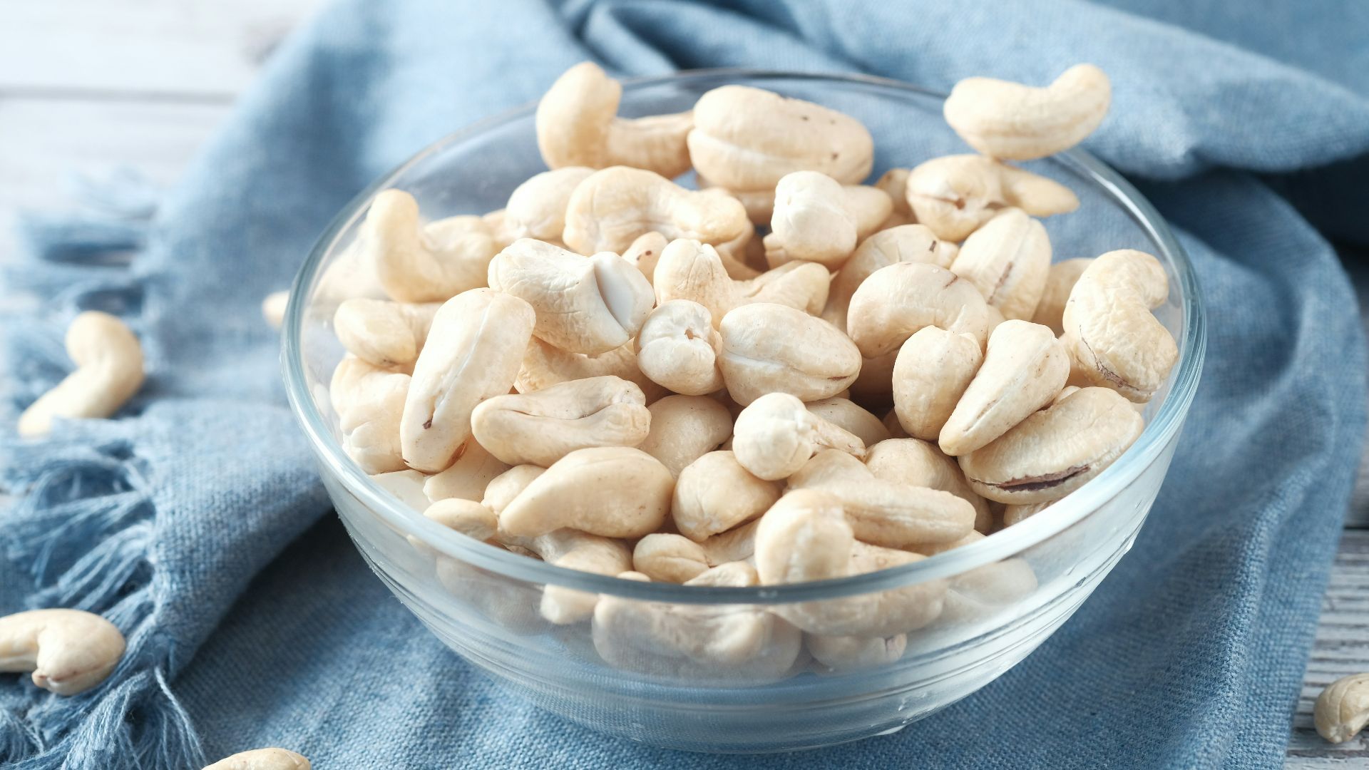 brown almond on clear glass bowl