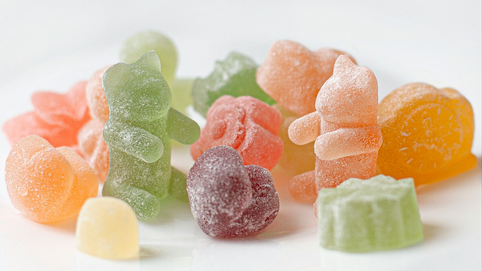 orange green and pink candies