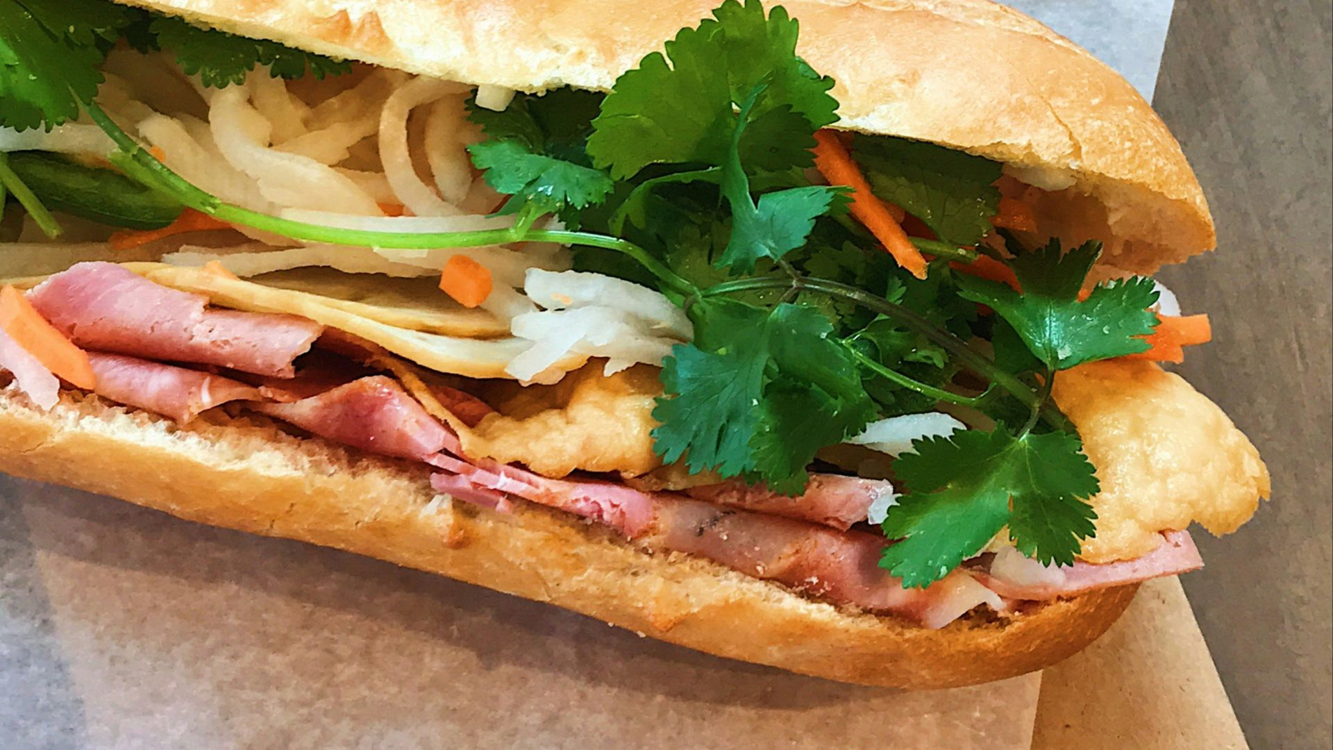 green vegetable on brown bread