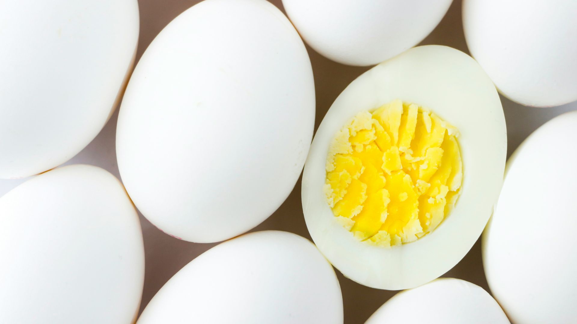 white egg lot on brown wooden table